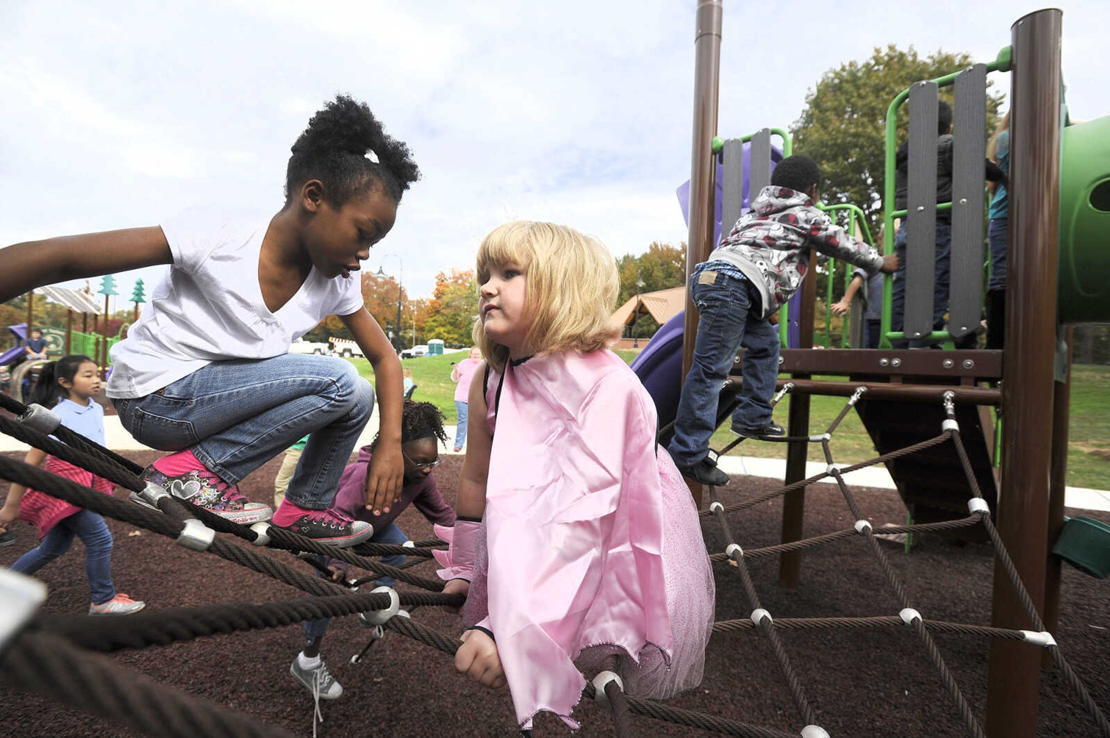 LAURA SIMON ~ lsimon@semissourian.com

Children test out the new playground at Capaha Park, Friday, Oct. 23, 2015, in Cape Girardeau.