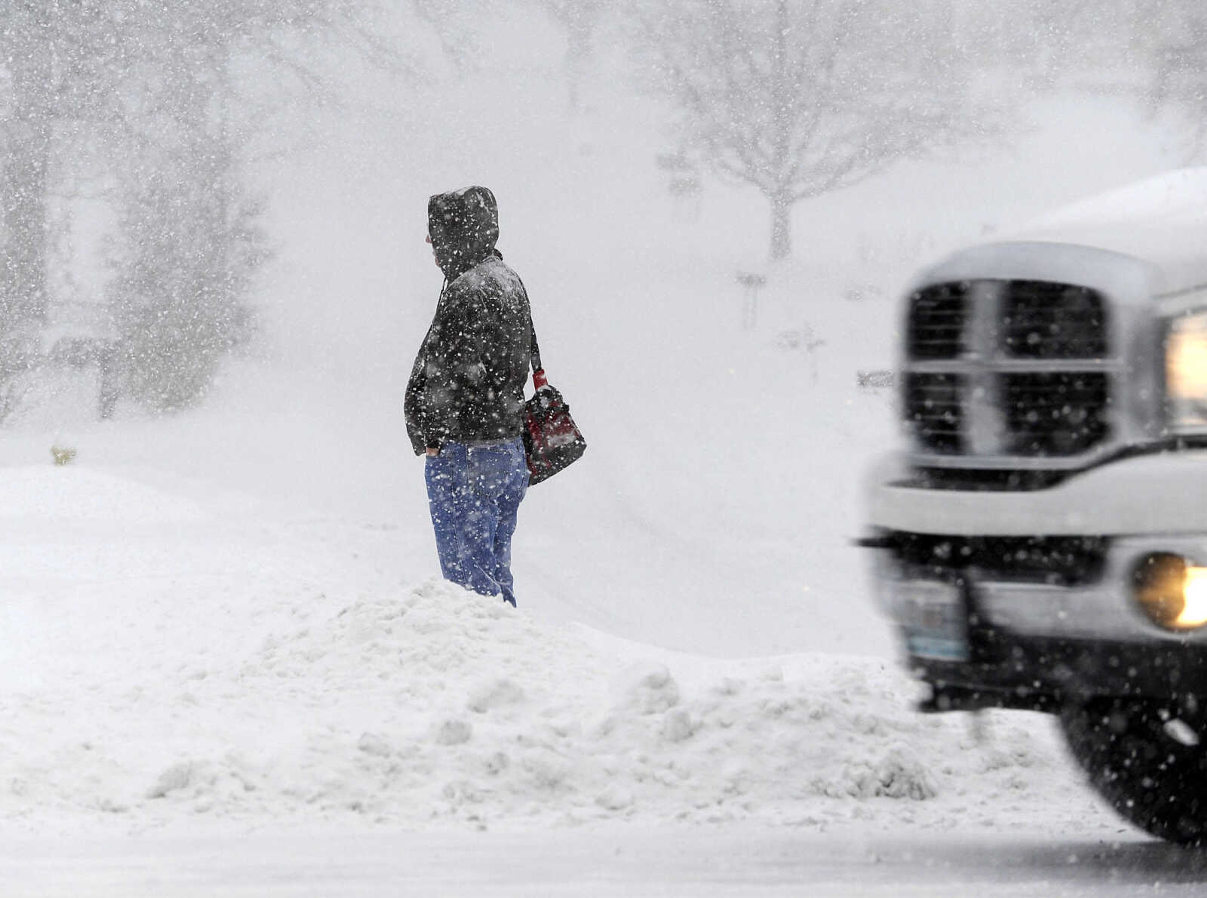 FRED LYNCH ~ flynch@semissourian.com
A pedestrian stands along North Kingshighway at East Rodney Drive Monday morning, Feb. 16, 2015 in Cape Girardeau.