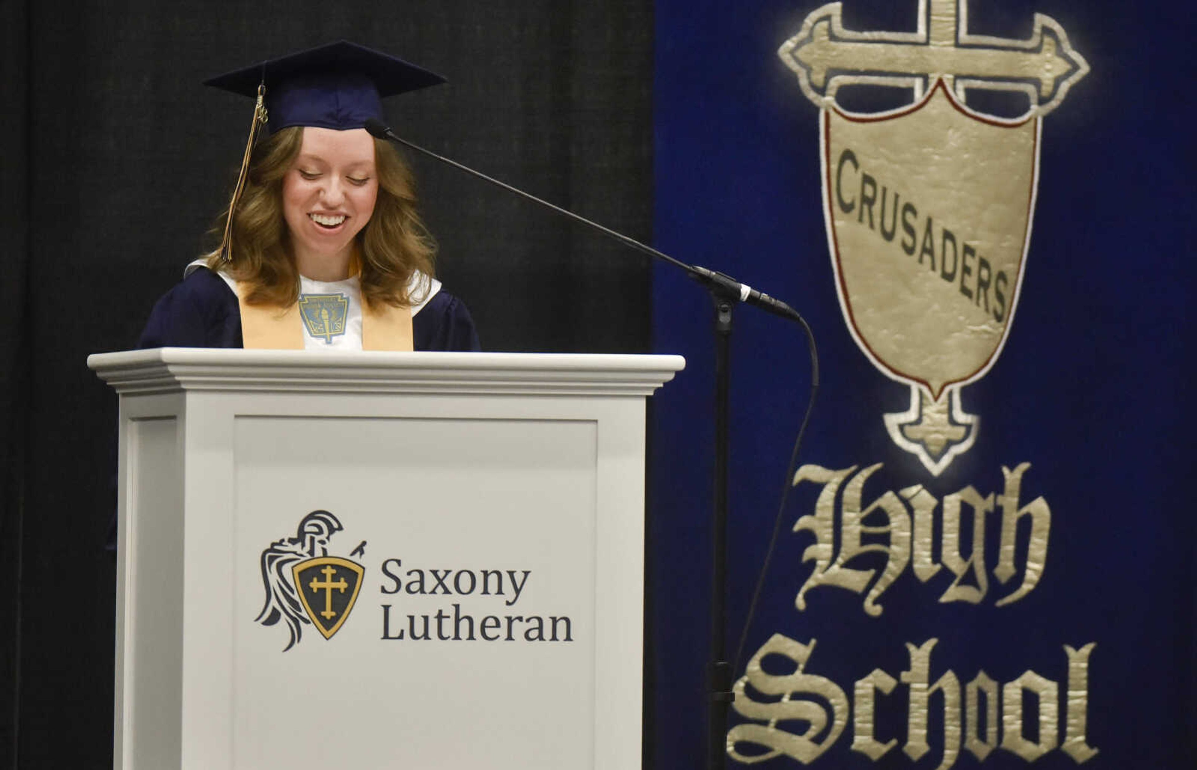 One of seven valedictorians, Ireland Smith delivers a valedictory address Sunday, May 20, 2018 at Saxony Lutheran High School in Jackson.