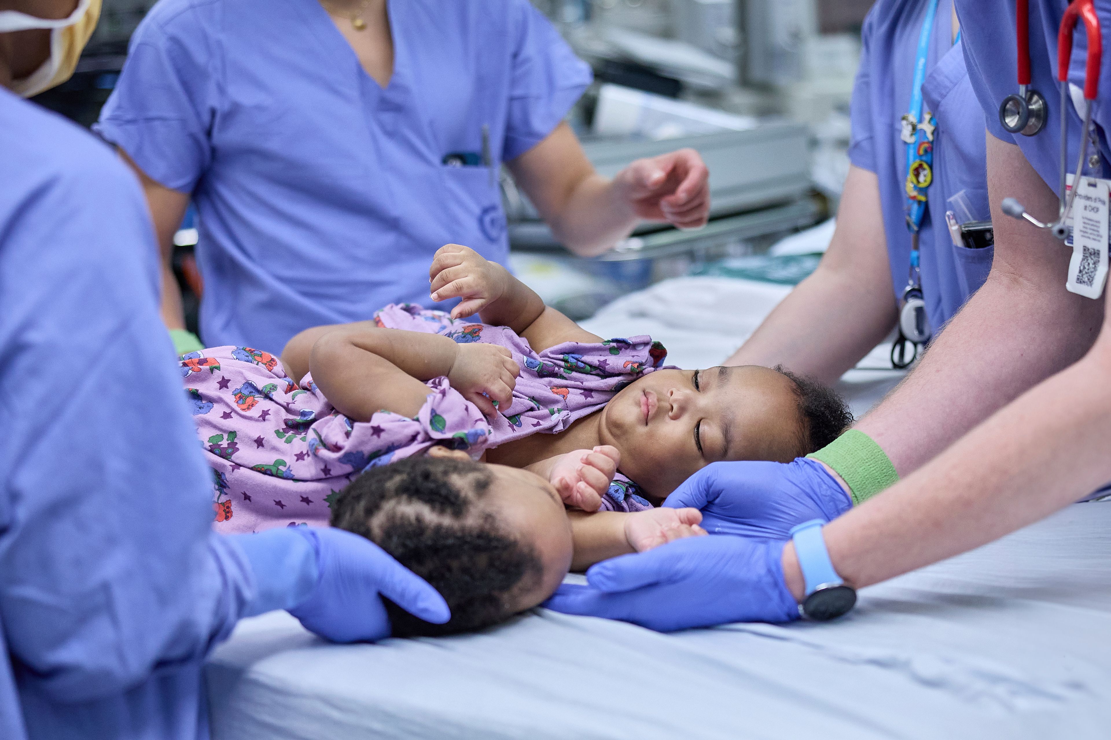 This photo provided by the Children’s Hospital of Philadelphia shows the hospital surgical team separating conjoined twins, Amari and Javar Ruffin, at the Children’s Hospital of Philadelphia, Aug. 21, 2024. (Ed Cunicelli/Children’s Hospital of Philadelphia via AP)