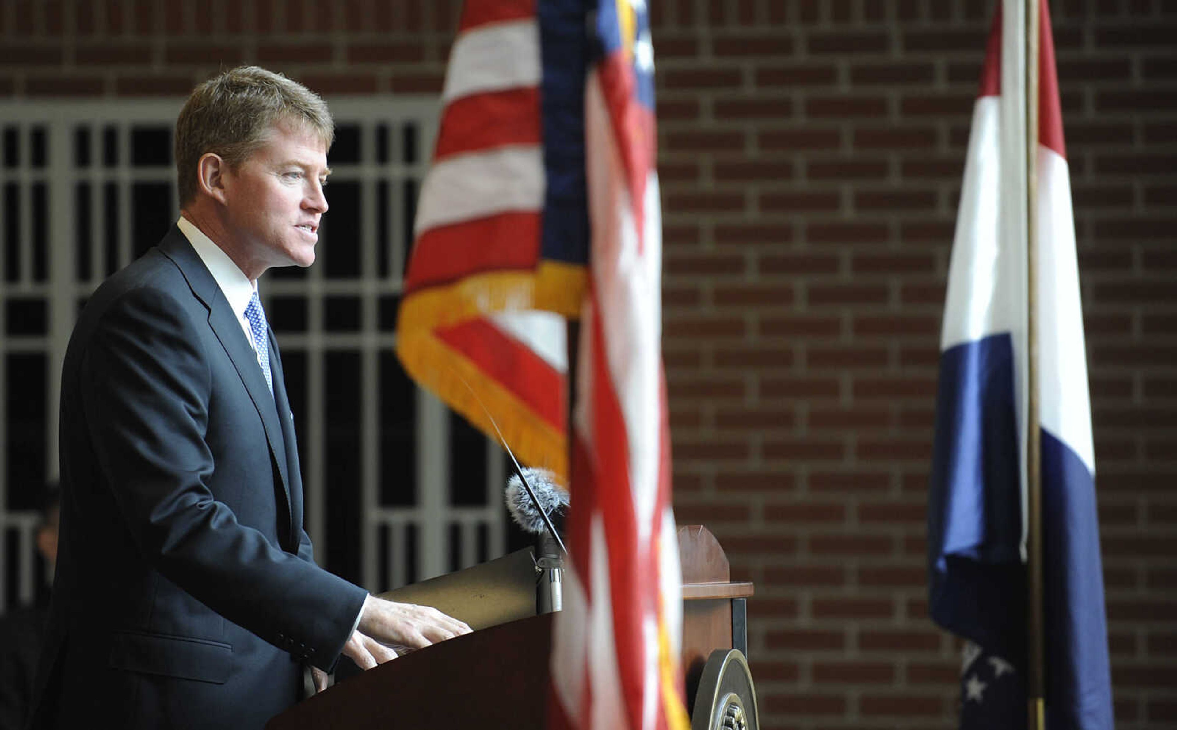 Missouri Attorney General Chris Koster speaks during a naturalization ceremony Wednesday, May 1, at the Rush H. Limbaugh Sr. U.S. Courthouse in Cape Girardeau. U.S. District Court Judge Stephen N. Limbaugh Jr. administered the Oath of Allegiance to 29 people from 11 countries, making them U.S. citizens, during the ceremony.