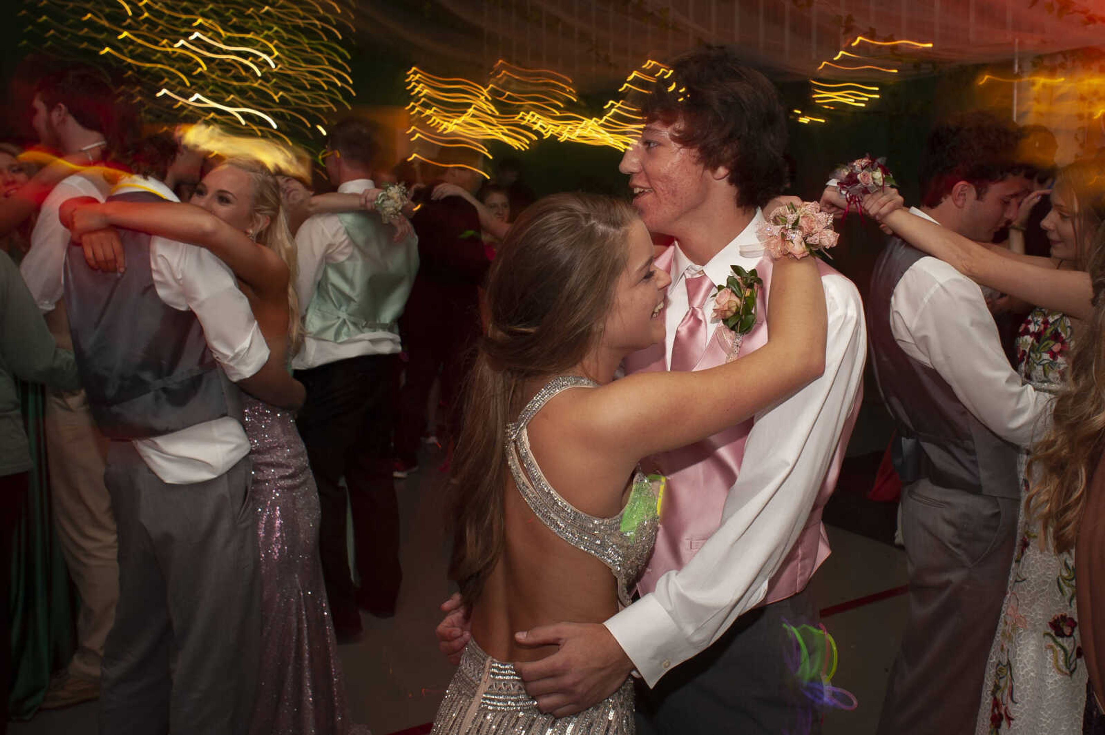 Delta senior Trevor Kelley dances with Woodland sophomore Abby Armstrong during Delta High School's prom on Saturday, April 13, 2019, at the Delta Community Center.