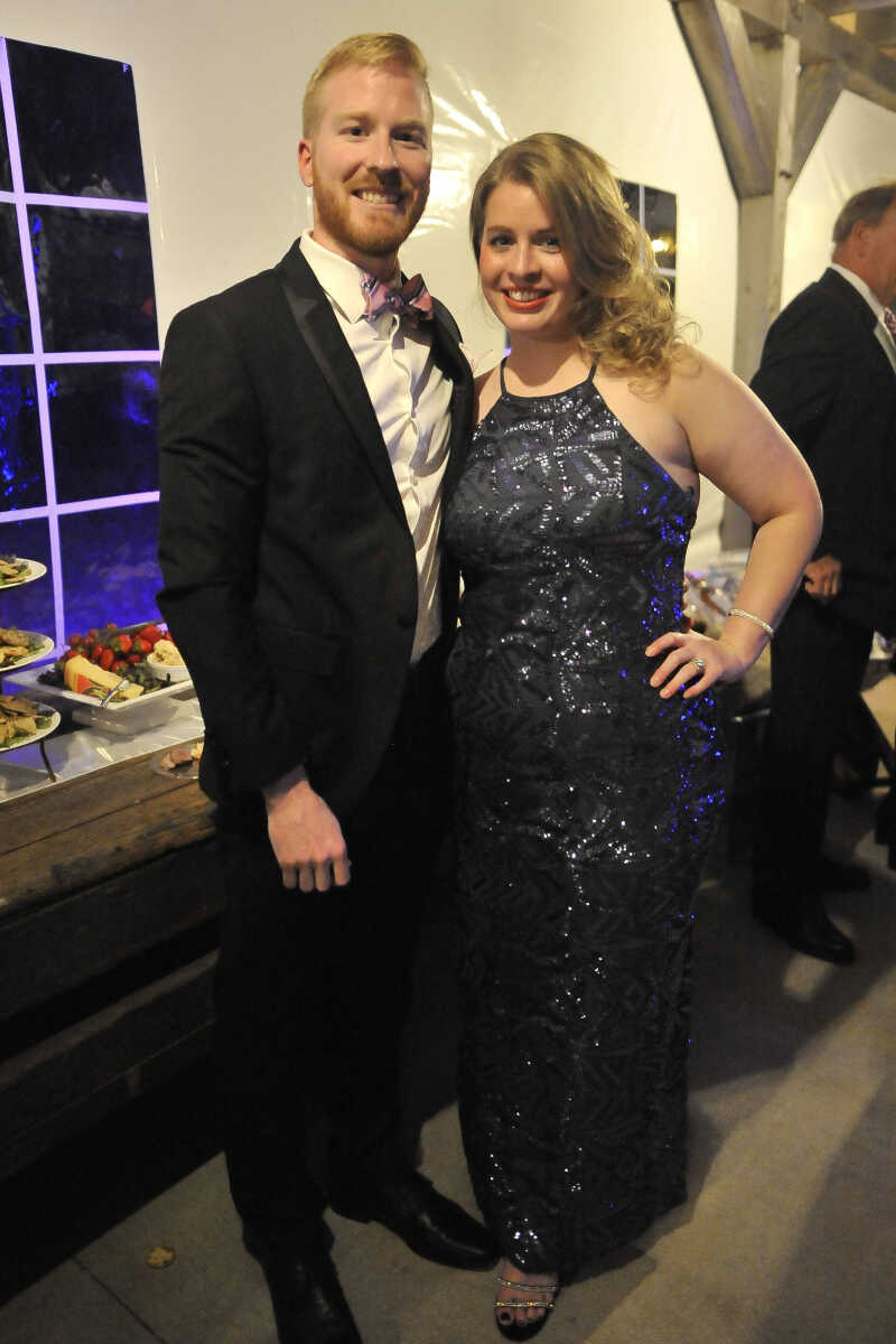 Andy Schneider and Chelsea Grigery pose for a photo during a fundraising gala for the American Cancer Society at Rusted Route Farms Saturday, Nov. 16, 2019, in Cape Girardeau.