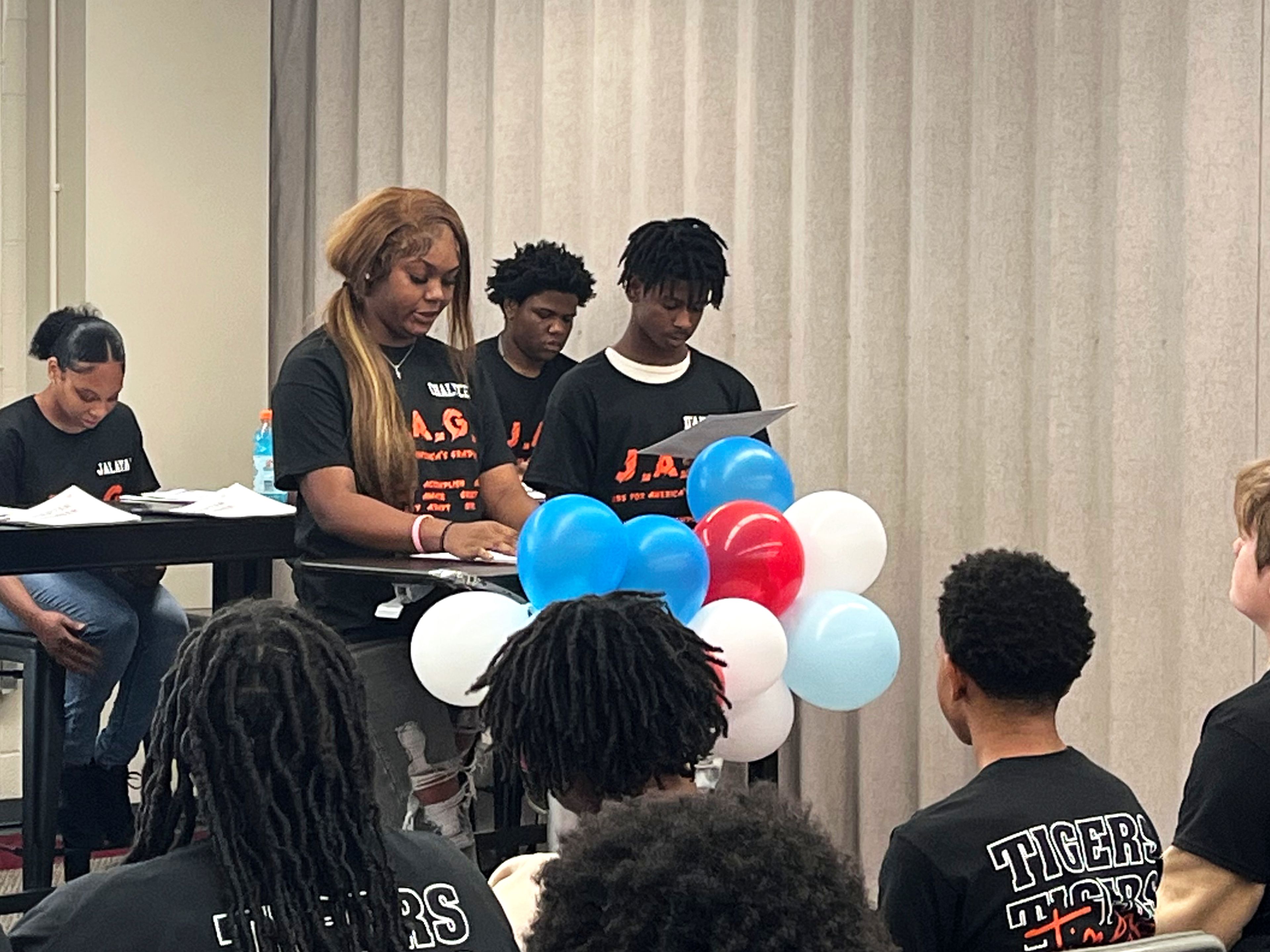 Cape Girardeau Central Academy students and co-presidents of the Jobs for America's Graduates (JAG) program Chalyce Horrell, left, and D'Angelo Wiggins give remarks during an installment ceremony  Wednesday, Oct. 2, at Cape Girardeau Public Schools' Central Administrative Offices.