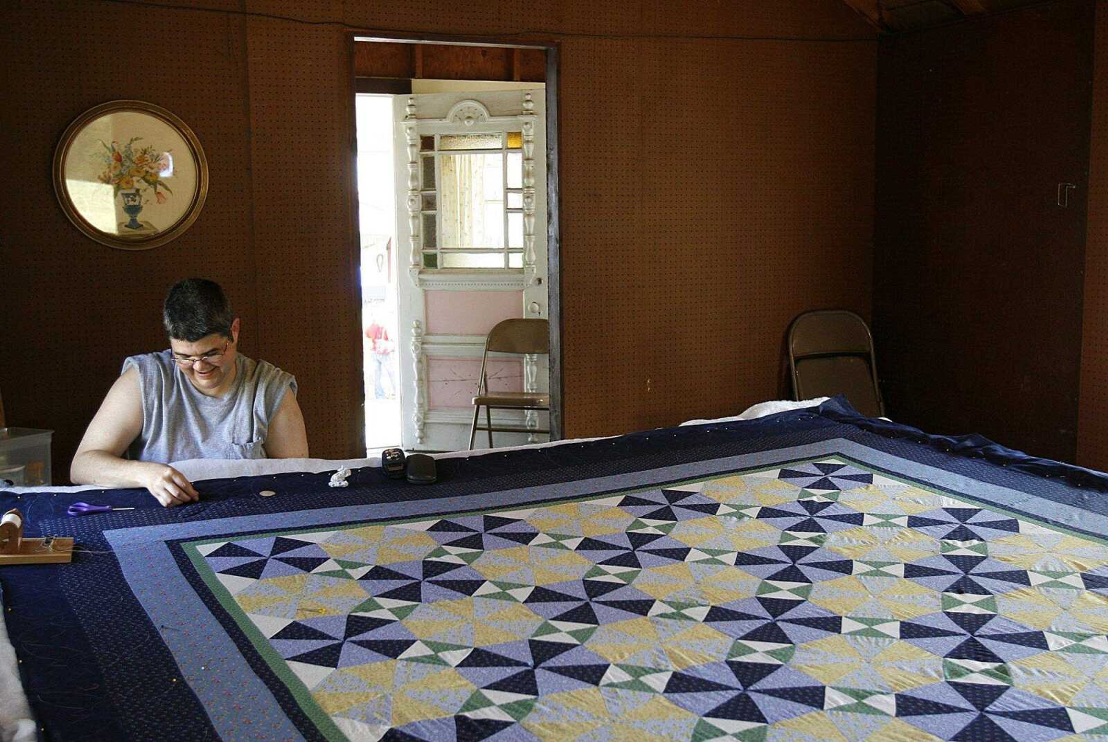 ELIZABETH DODD ~ edodd@semissourian.com
Brenda Kline, of Perryville, enjoys a peaceful moment of quilting at the Black Forest Villages 18th Annual October Fest Saturday. Kline has been quilting for 15 years.