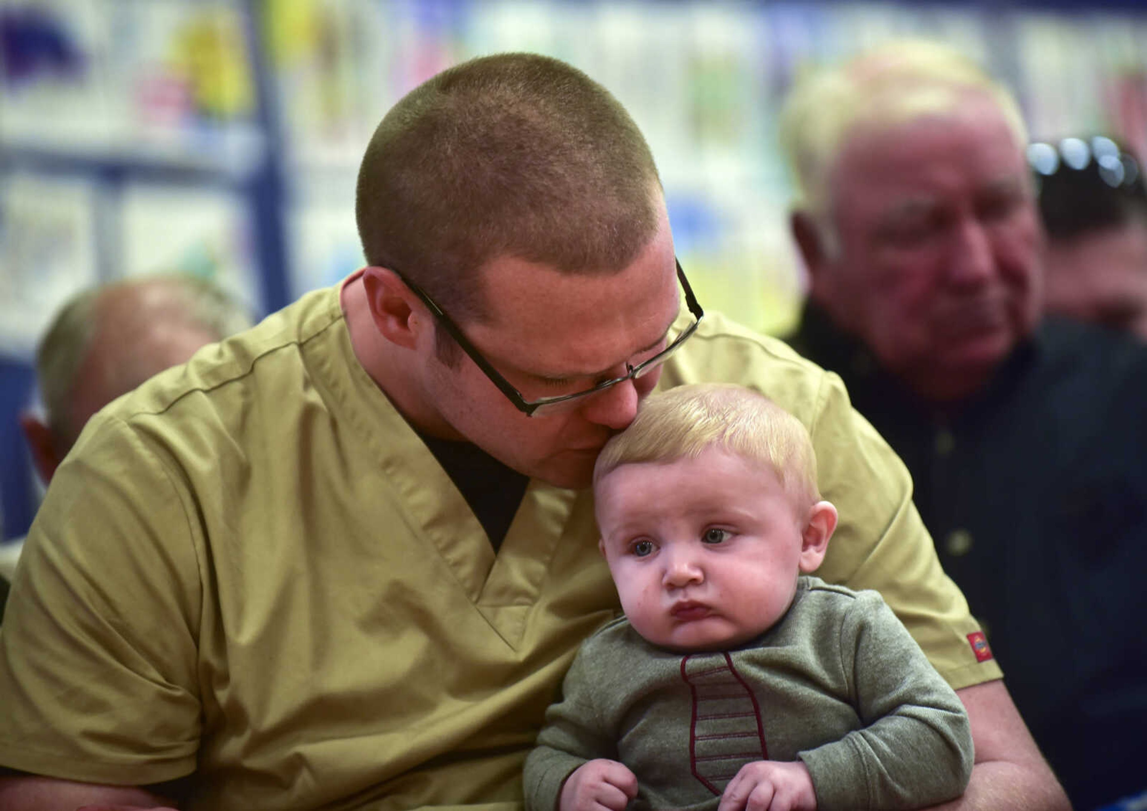 ANDREW J. WHITAKER ~ awhitaker@semissourian.com
Veteran William Hall kisses his son Emmett Kershaw during the Oran High school Veterans Day program Friday, Nov. 11, 2016 at Oran.