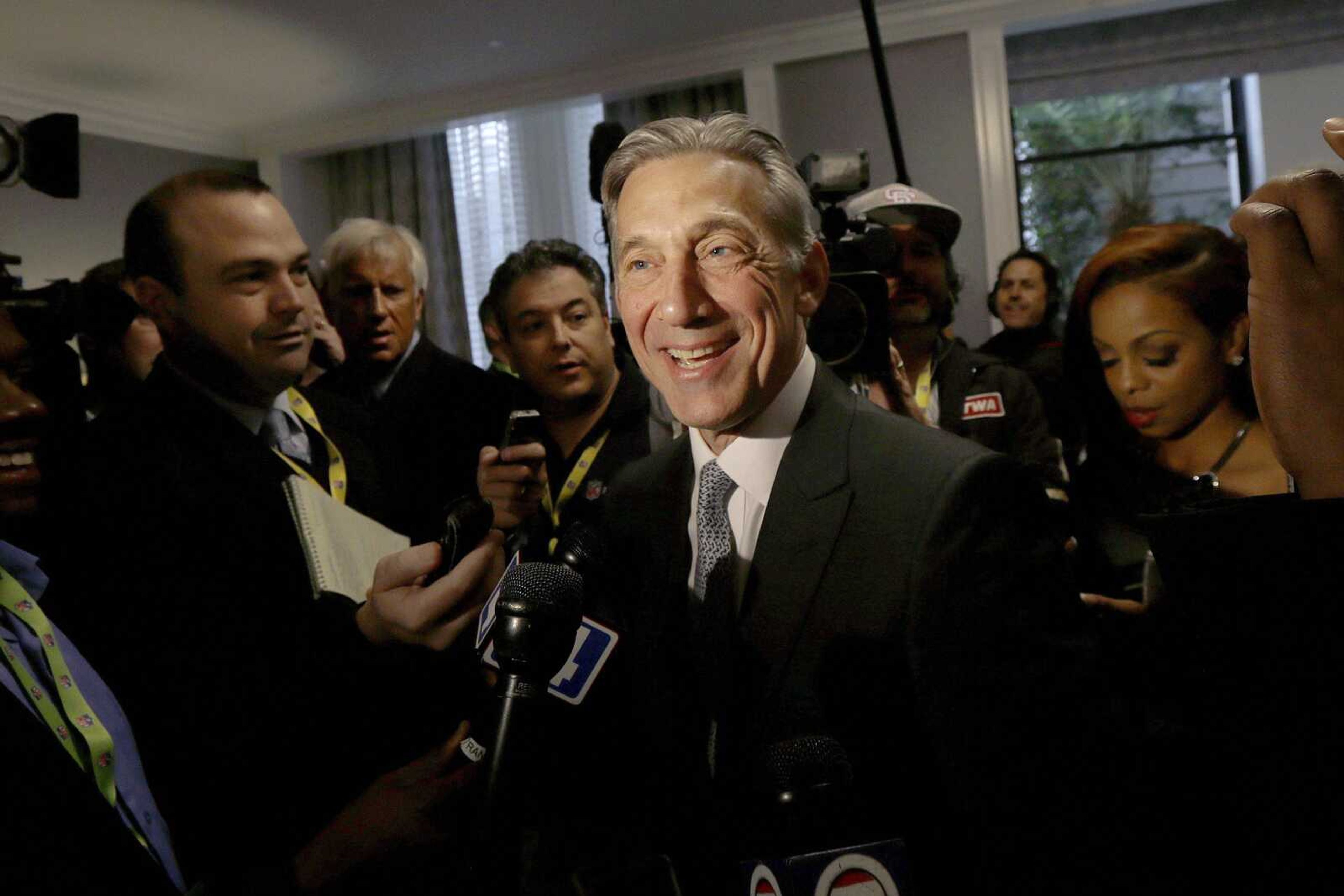 NFL vice president Eric Grubman smiles while speaking to reporters during the NFL's spring meetings Wednesday in San Francisco. Grubman is the league's lead man on a possible return to Los Angeles. (Jeff Chiu ~ Associated Press)