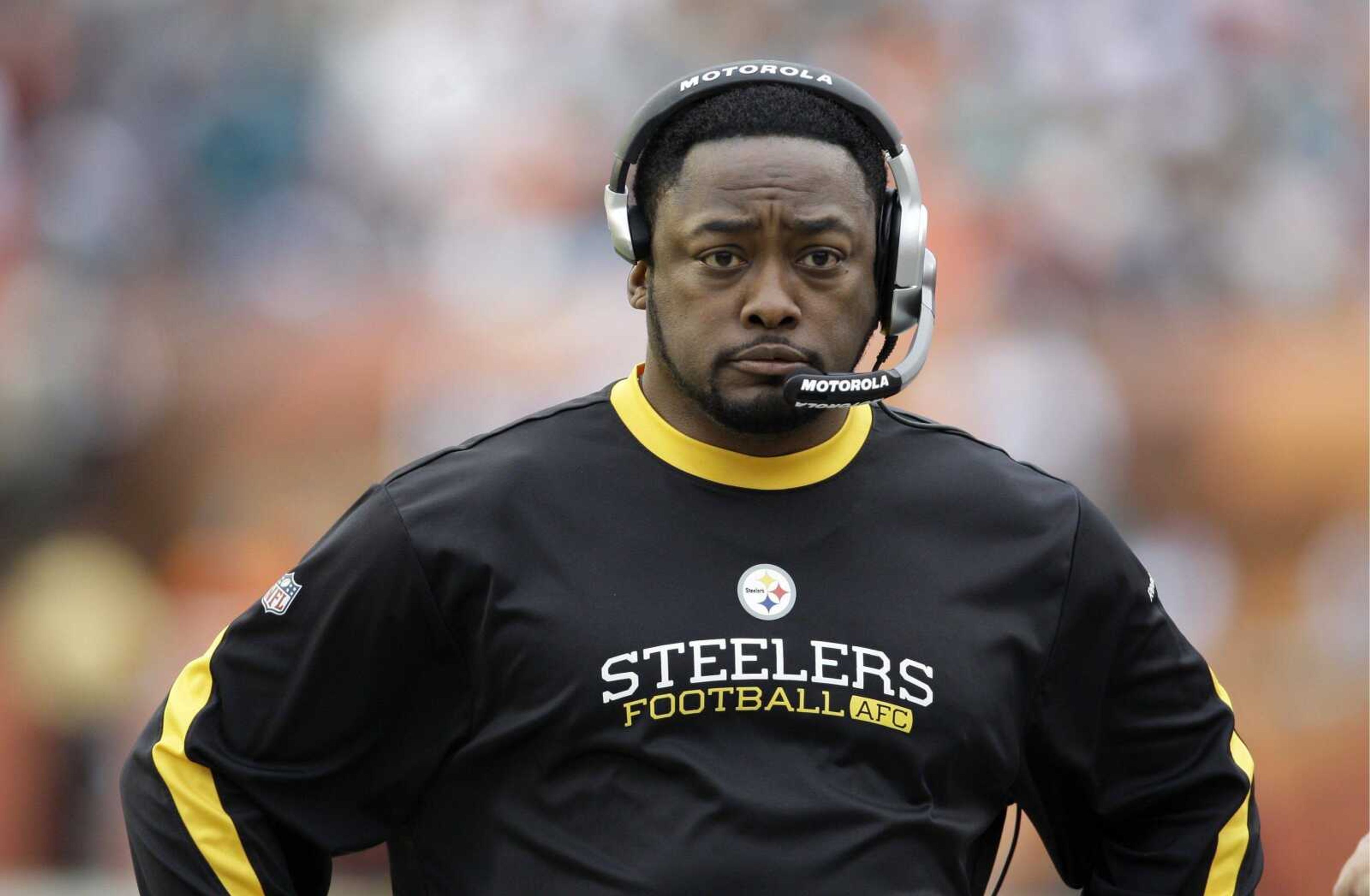 Steelers coach Mike Tomlin walks the sidelines during the fourth quarter of Pittsburgh's 30-24 win against the Miami Dolphins. The defending Super Bowl champions finished with a 9-7 record and fell short of the playoffs. (LYNN SLADKY ~ Associated Press)