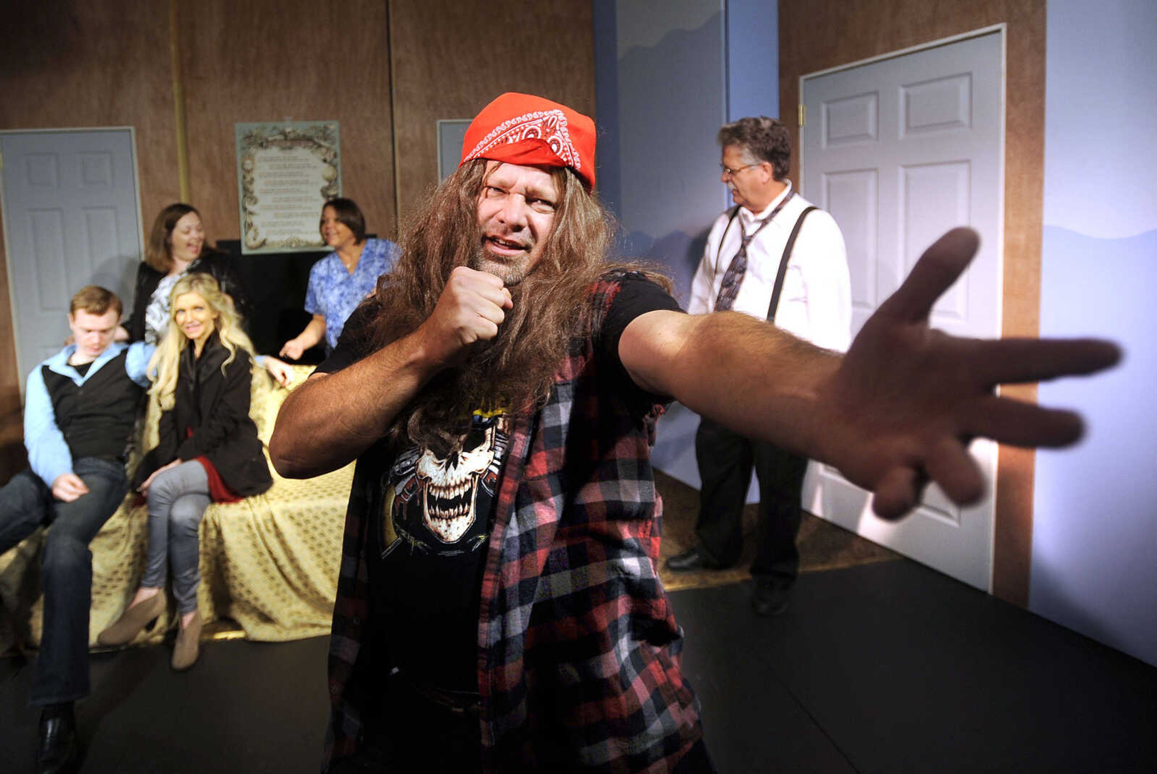 FRED LYNCH ~ flynch@semissourian.com
Tim Mills as Presley York sings "Sweet Caroline" in a scene from "And Then There Was One," during a rehearsal of the murder-mystery Tuesday, Nov. 7, 2017 by the River City Players at Port Cape Girardeau.