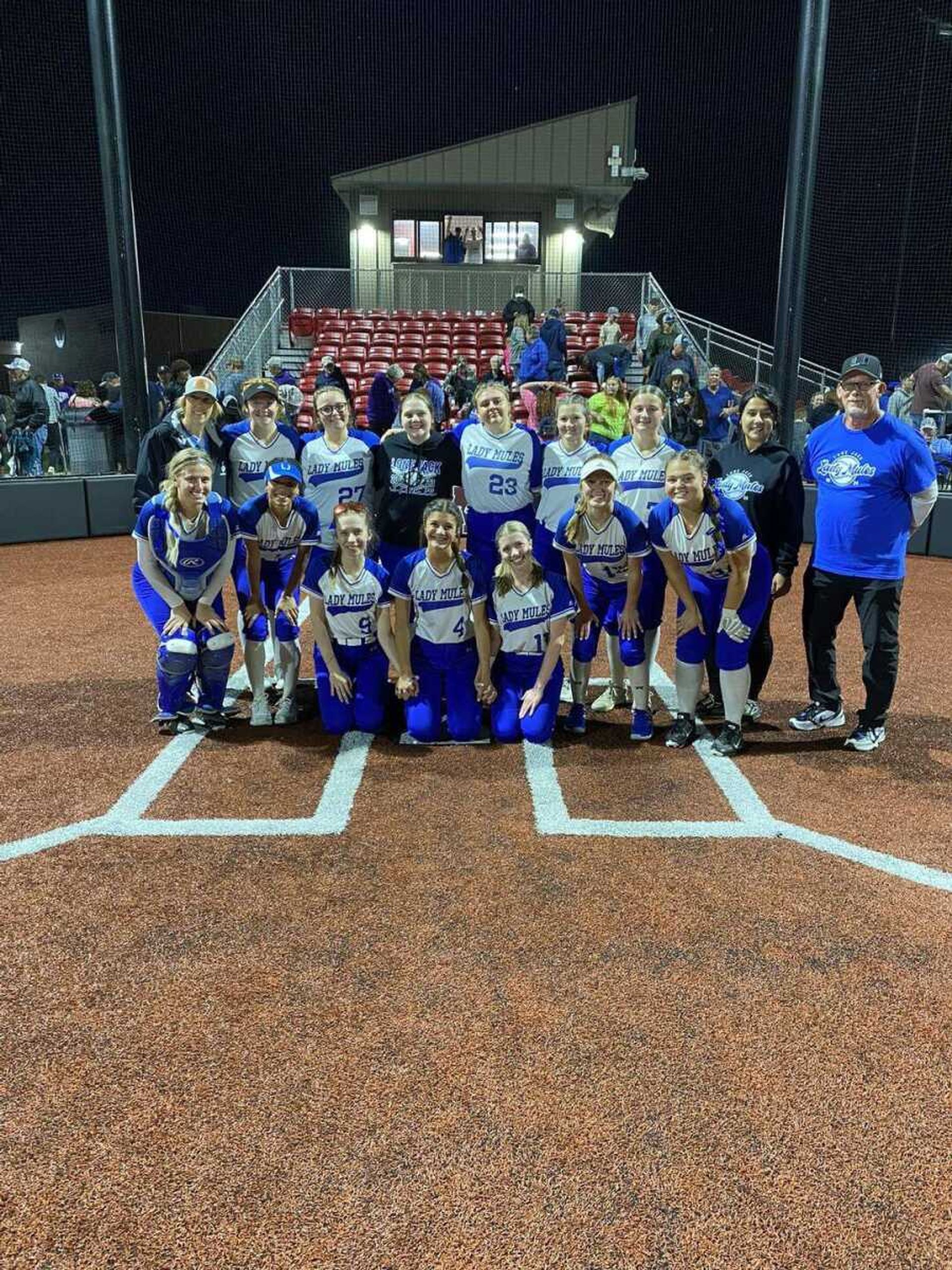 Lone Jack High School Lady Mules celebrate the win that propelled the squad to MSHSAA Class 2 State Tournament semifinals. 