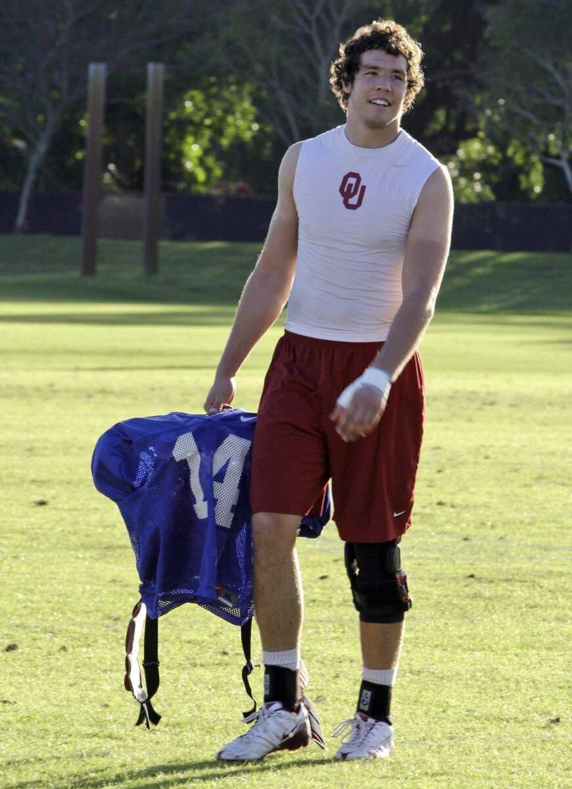 Oklahoma quarterback Sam Bradford walks off the field following football practice at Barry University in Miami Shores, Fla., Tuesday, Jan. 6, 2009. Oklahoma plays Florida in the BCS Championship NCAA college football game on Thursday Jan. 8. (AP Photo/ Lynne Sladky)