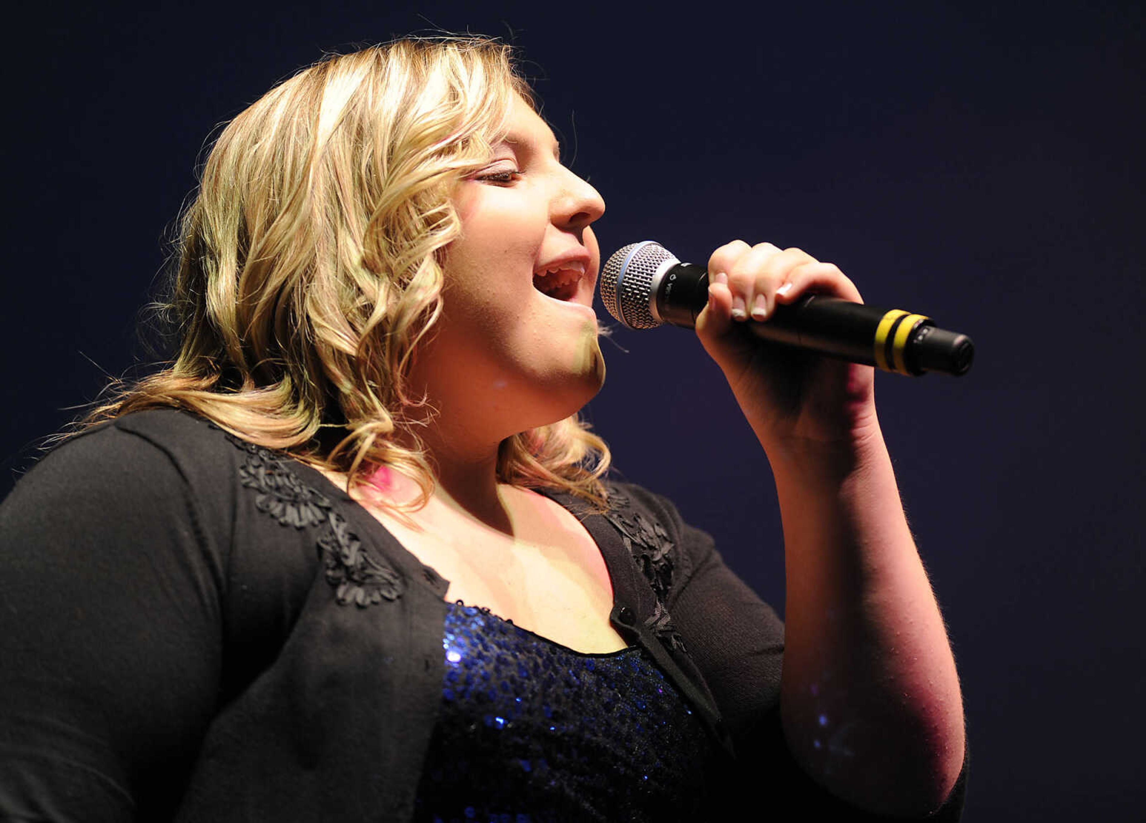 Olivia Gordon of Anna, Ill., performs in the finals 2012 Heartland Idol competition at at the SEMO District Fair Wednesday, September 12, at Arena Park in Cape Girardeau.