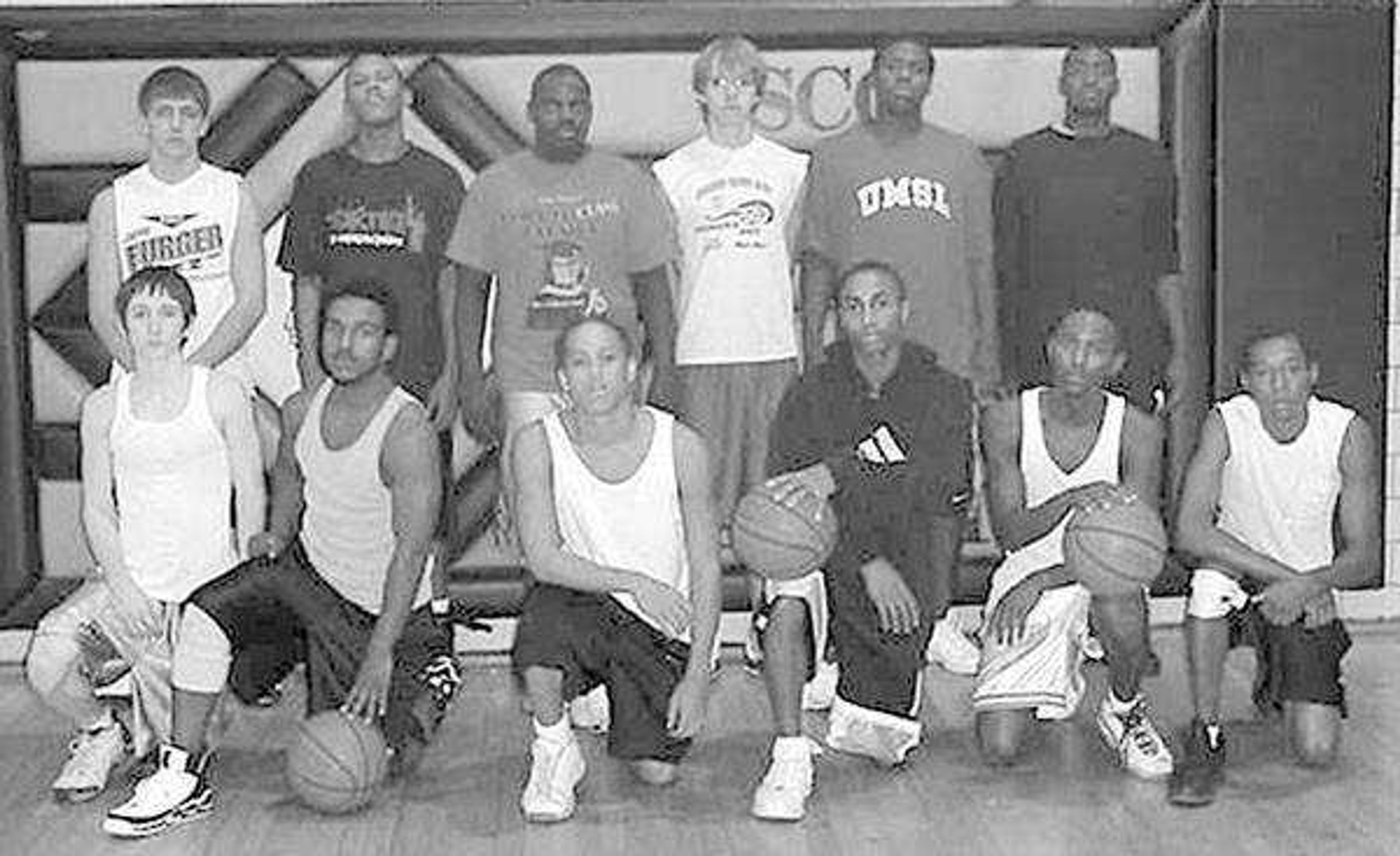 Members of the Scott County Central boys basketball team, from left: Front -- Toby Heeb, Josh Chamberlain, Avery Williams, D.D. Gillespie, Robert Jones, Zack Blackmon; Back -- Mark Freed, Drew Thomas, Pershard Owens, Josh Holman, Caleb Johnson and Curtis Avance.