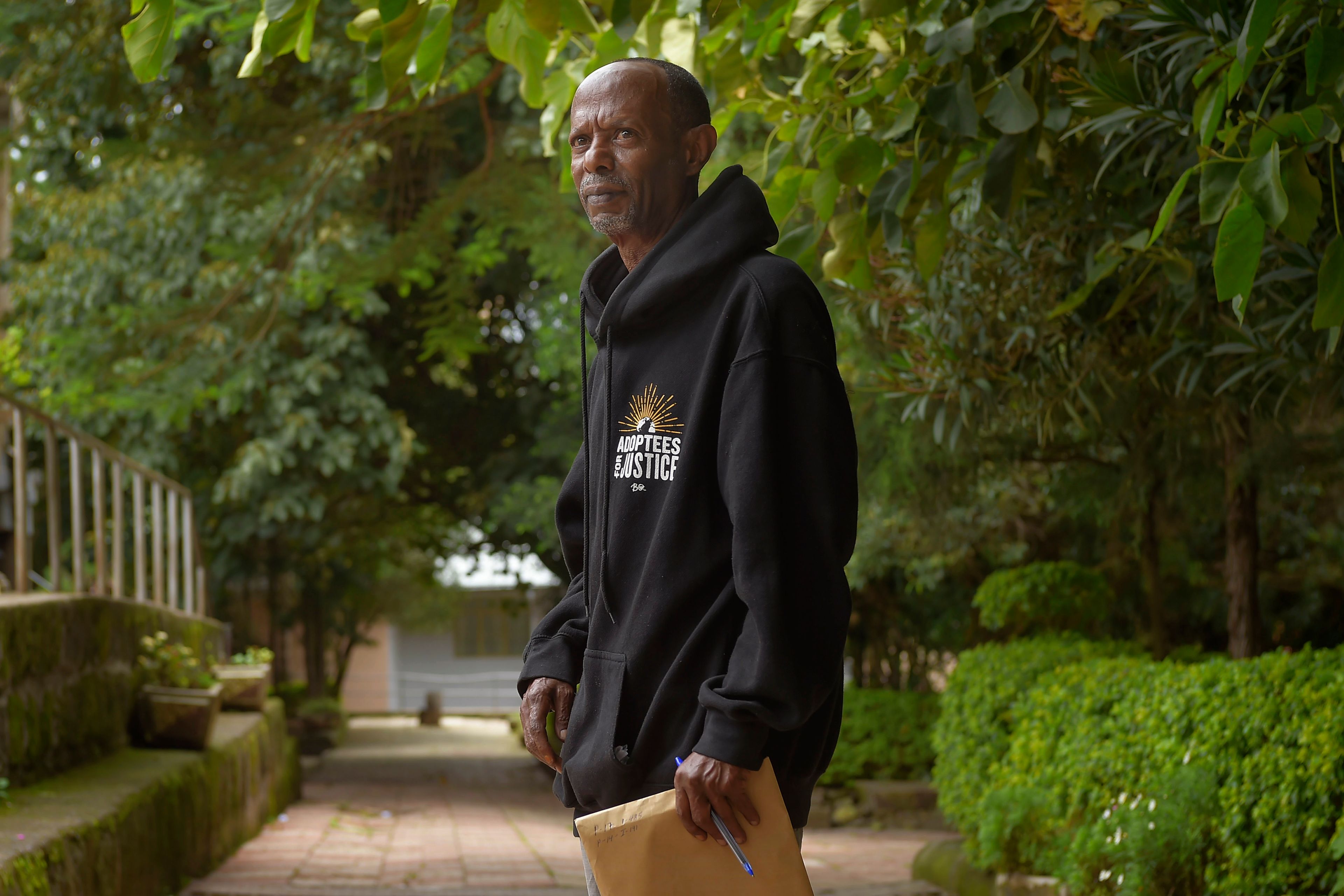 Mike Davis, 61, is photographed in Addis Ababa, Ethiopia, Friday, Aug. 23, 2024. One day in 2003, he closed his pizza shop and went to bed, someone banged on their door at 5 a.m. "My kids were sleeping," he said, "When they woke up, their dad was gone." Davis was being deported back to Ethiopia. (AP Photo)