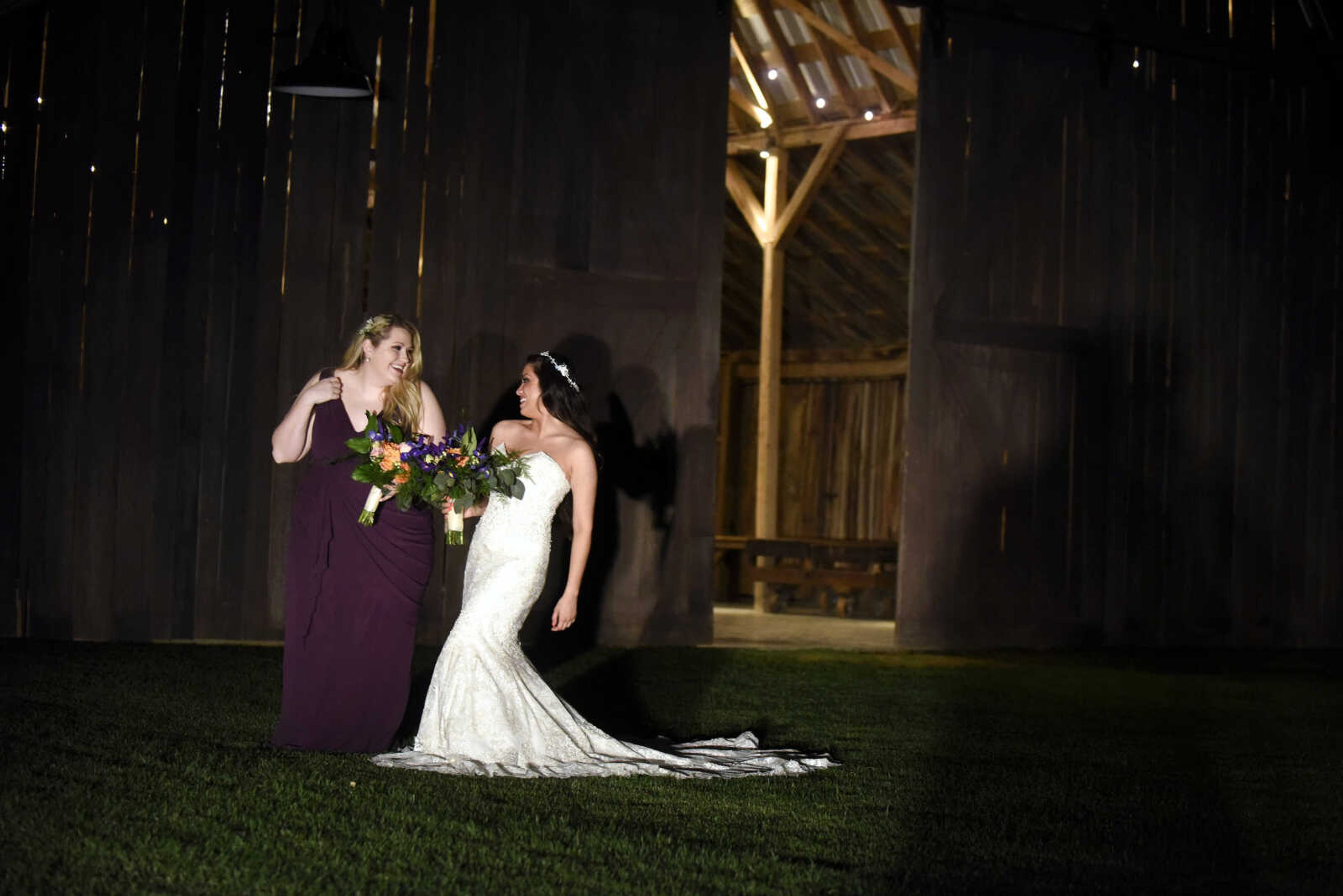 Allure Bridals gown with a detailed head piece from Marionat and rounded square earrings from Jim Ball. Available at Joy's Bridal in Sikeston, Missouri.

Bill Levkoff plum bridesmaid gown with dangly pearl earring from Jim Ball. Available at Joy's Bridal in Sikeston, Missouri.