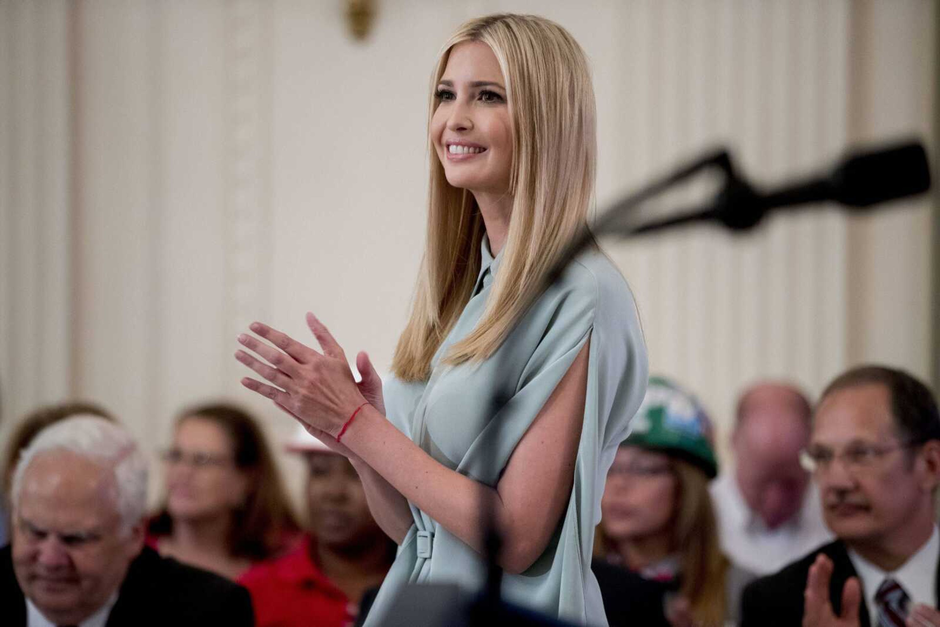 Ivanka Trump, daughter of President Donald Trump, applauds during a signing ceremony where the president signed an executive order establishing a National Council for the American Worker in the East Room of the White House, in Washington. Ivanka Trump's clothing company is shutting down and all its employees are being laid off.