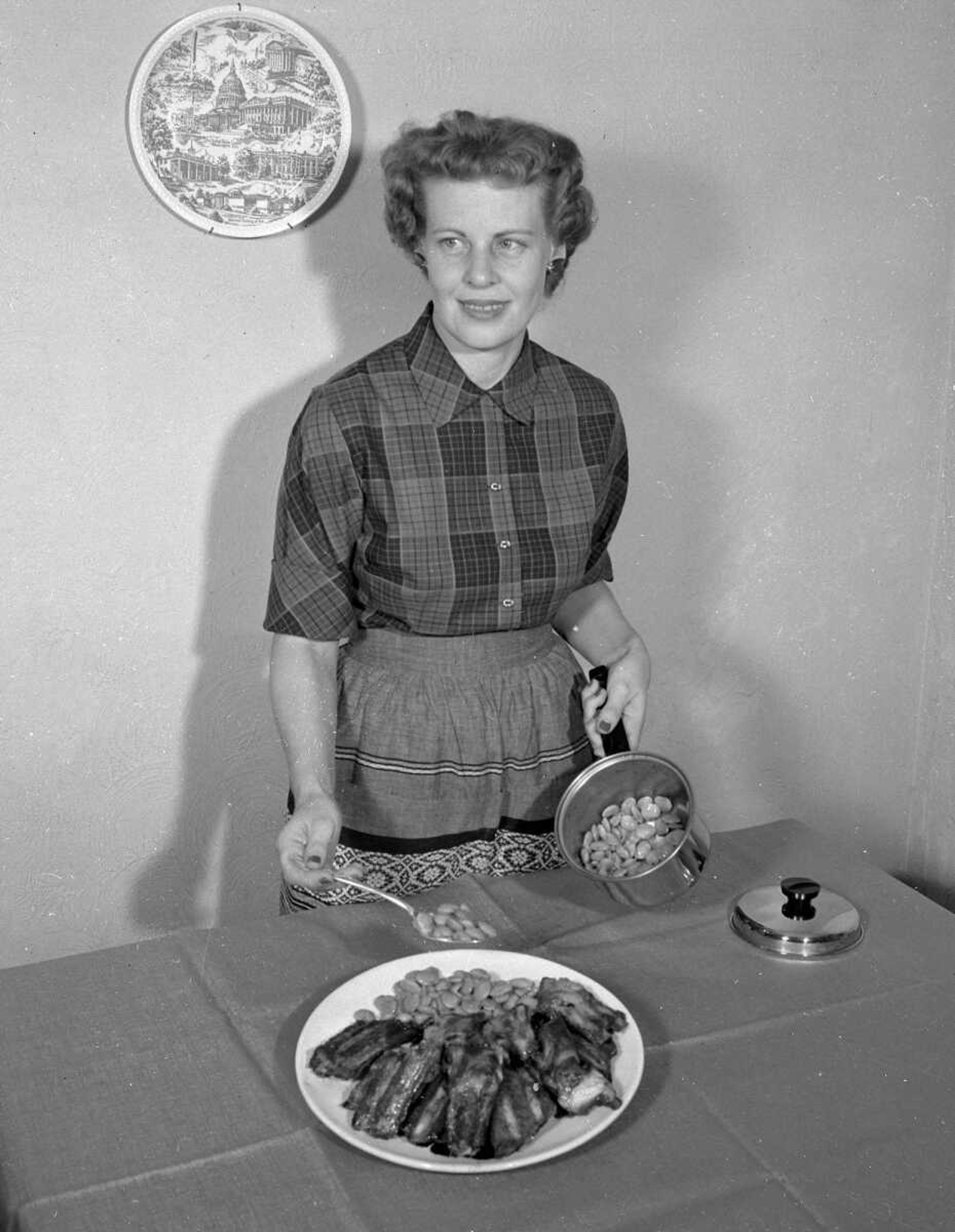 Looks like this homemaker cooked up a fine mess of beans and ribs. If you can provide information about this image, contact librarian Sharon Sanders at ssanders@semissourian.com.