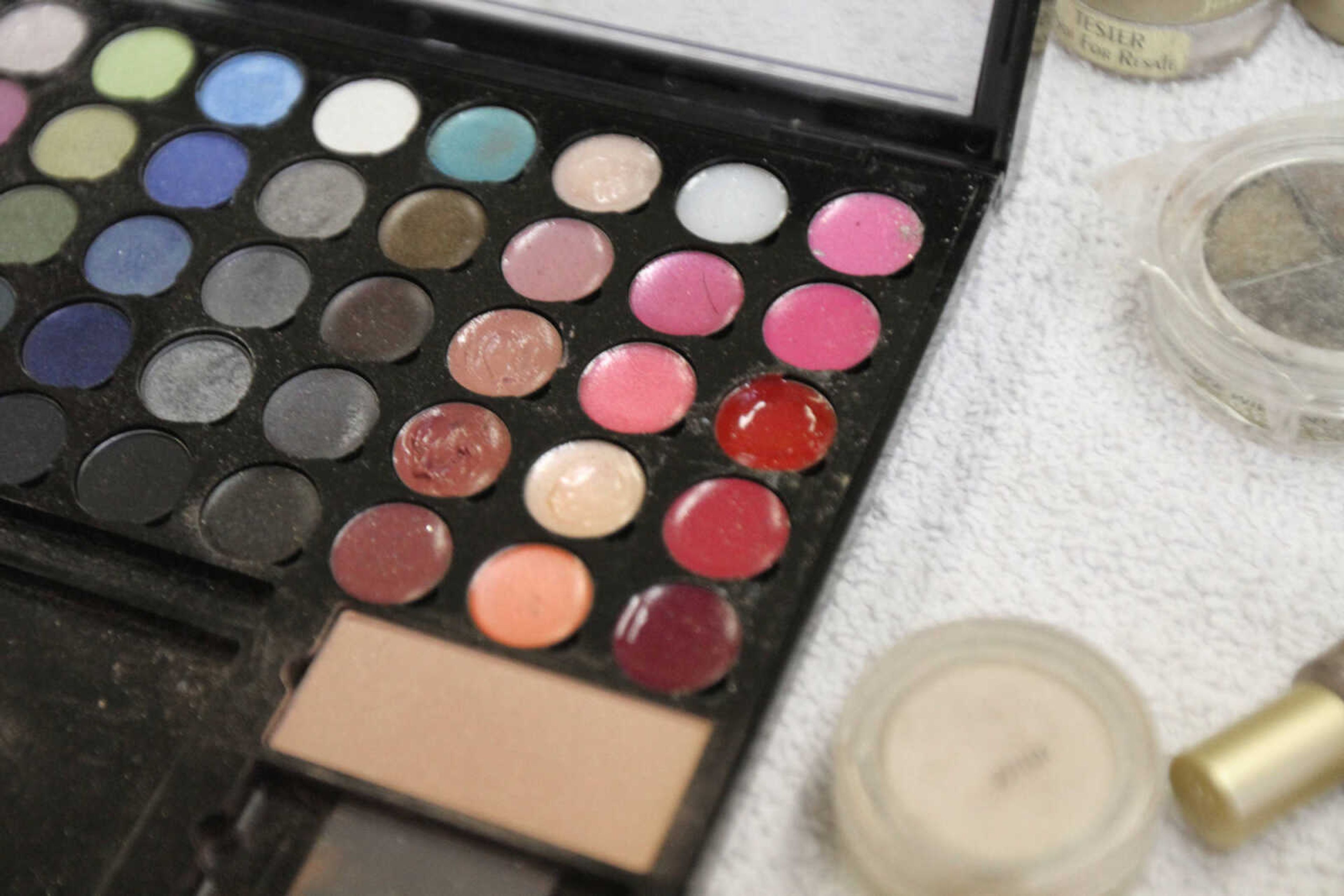 GLENN LANDBERG ~ glandberg@semissourian.com

Make-up rests on a table during the fifth annual Help-Portrait event Saturday, Dec. 6, 2014 at the House of Hope in Cape Girardeau.