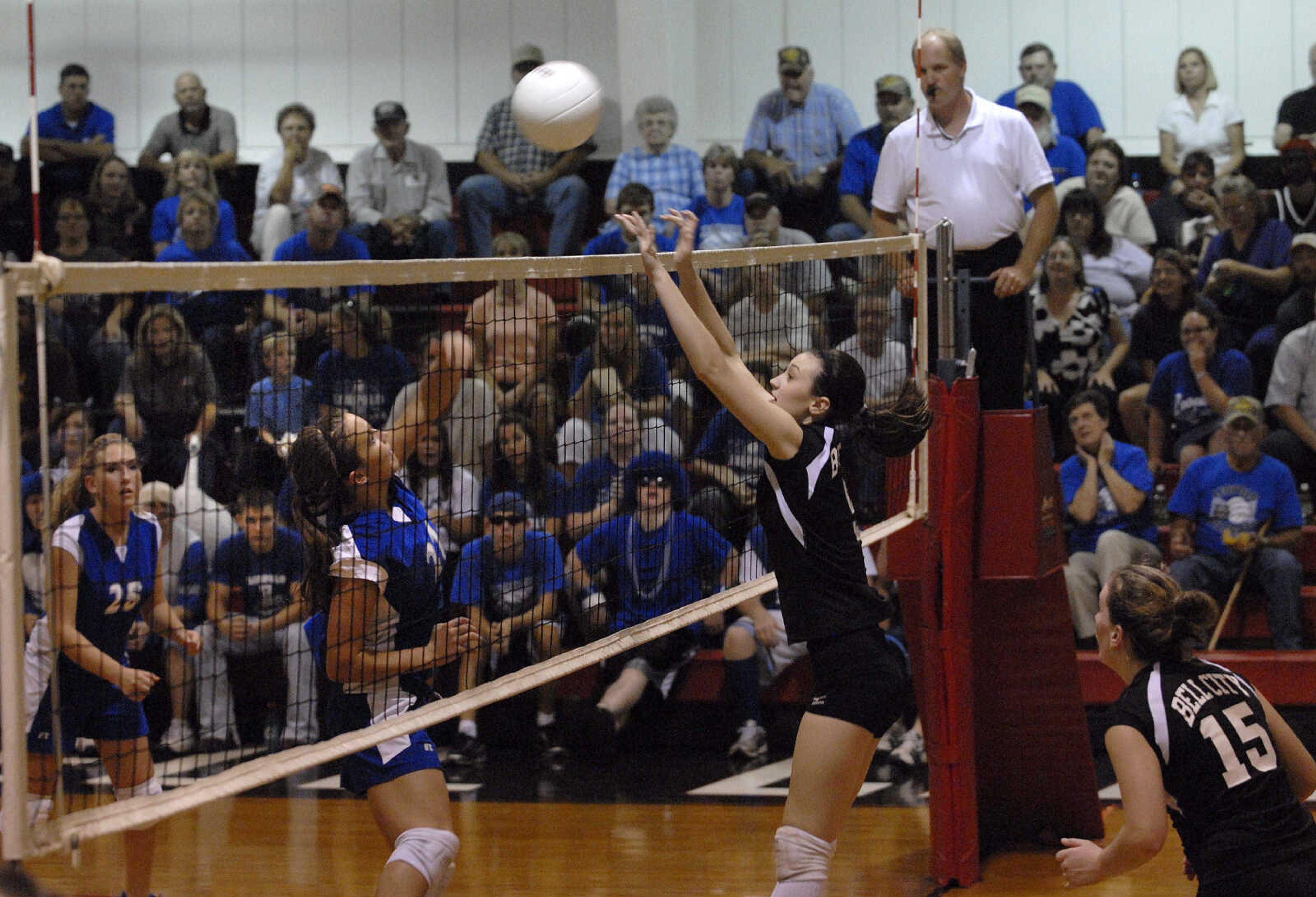 FRED LYNCH ~ flynch@semissourian.com
Bell City's Alex Eakin tries to block a shot by Leopold's Lauren Seiler during the third game Friday at Bell City.