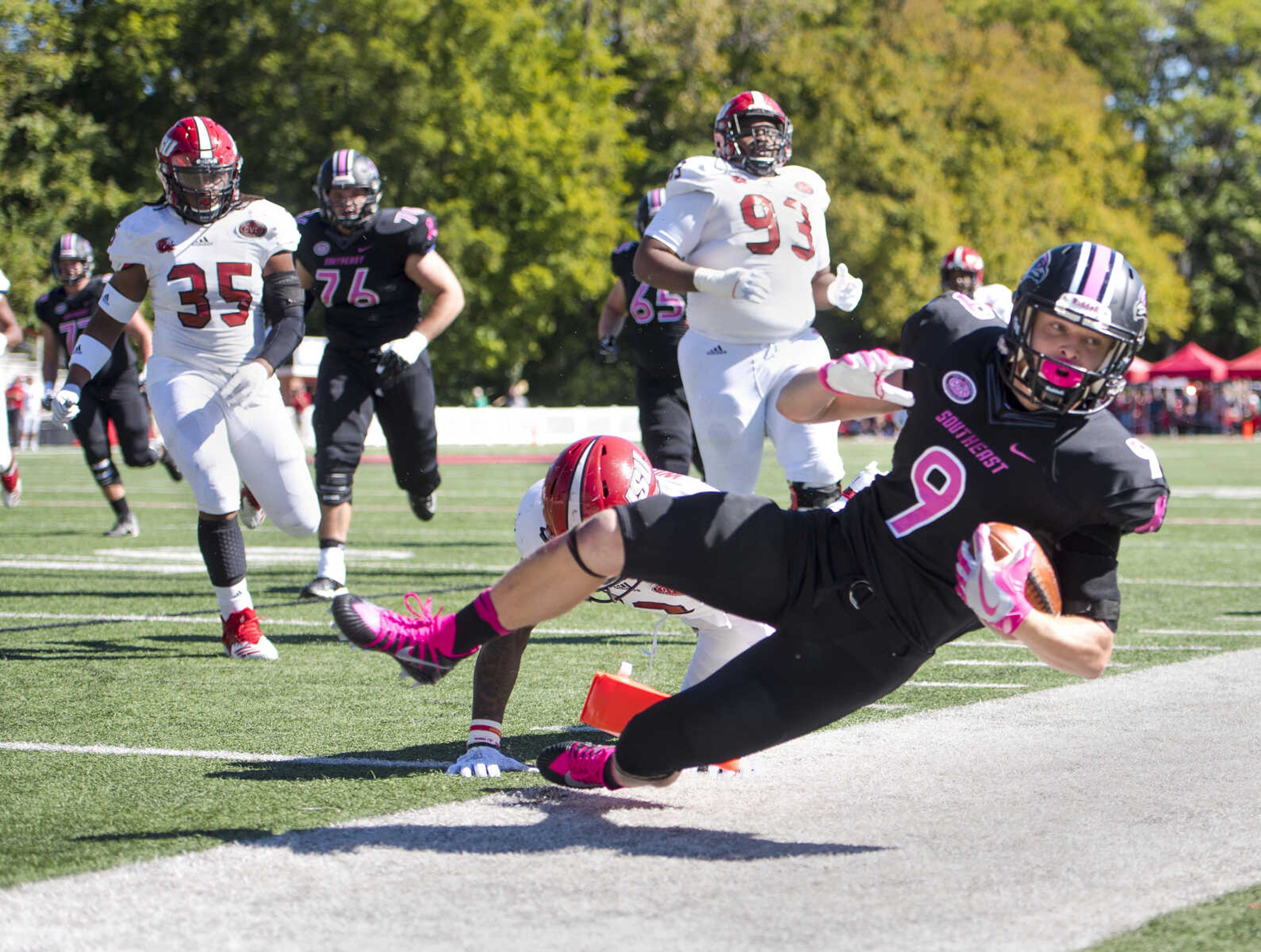 Southeast Missouri State wide receiver Zack Smith (9) is knocked over the pylon to score the first touchdown in a conference game against Jacksonville State on Saturday, Oct. 20, 2018, at Houck Stadium in Cape Girardeau.