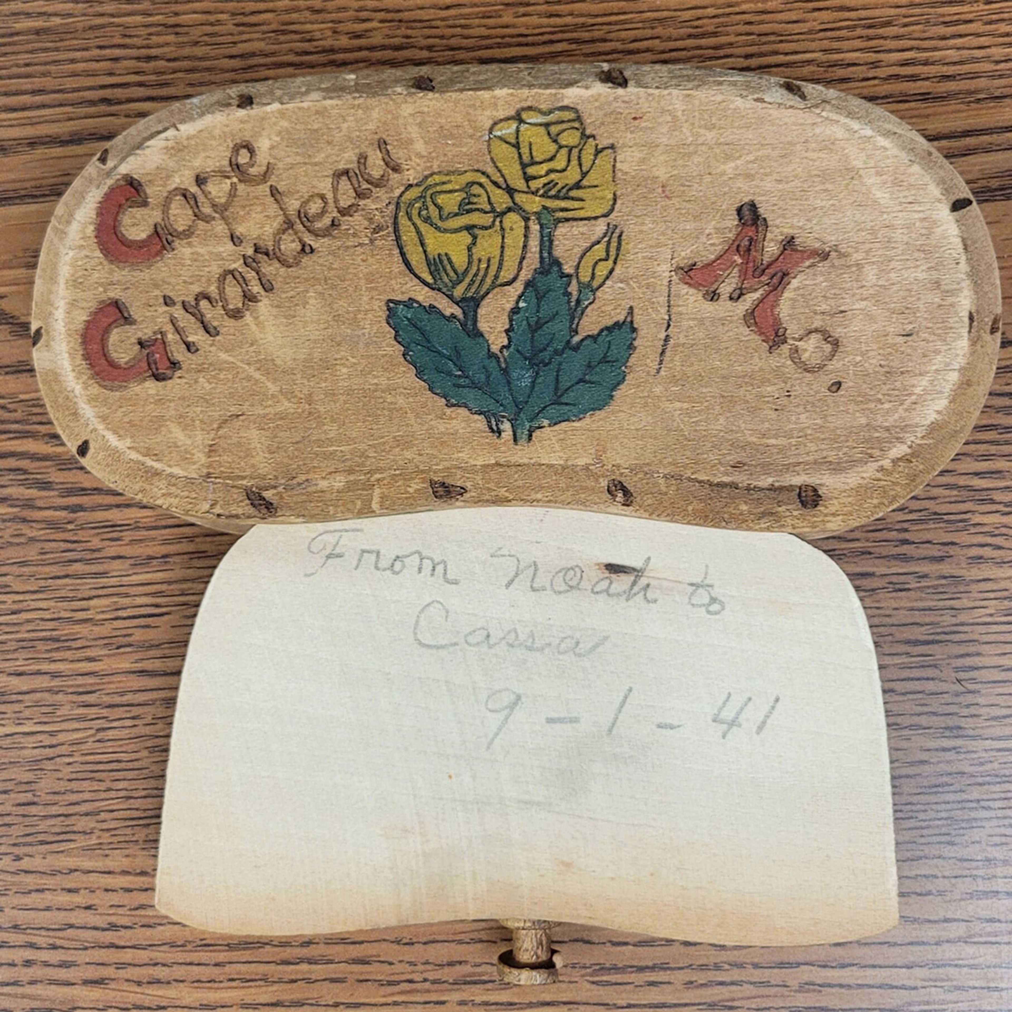 This mystery box, donated to the Cape Girardeau County Archive Center in Jackson, offers lots of clues but few leads to the identity of its original owners. It was photographed Monday, July 1, at the center.