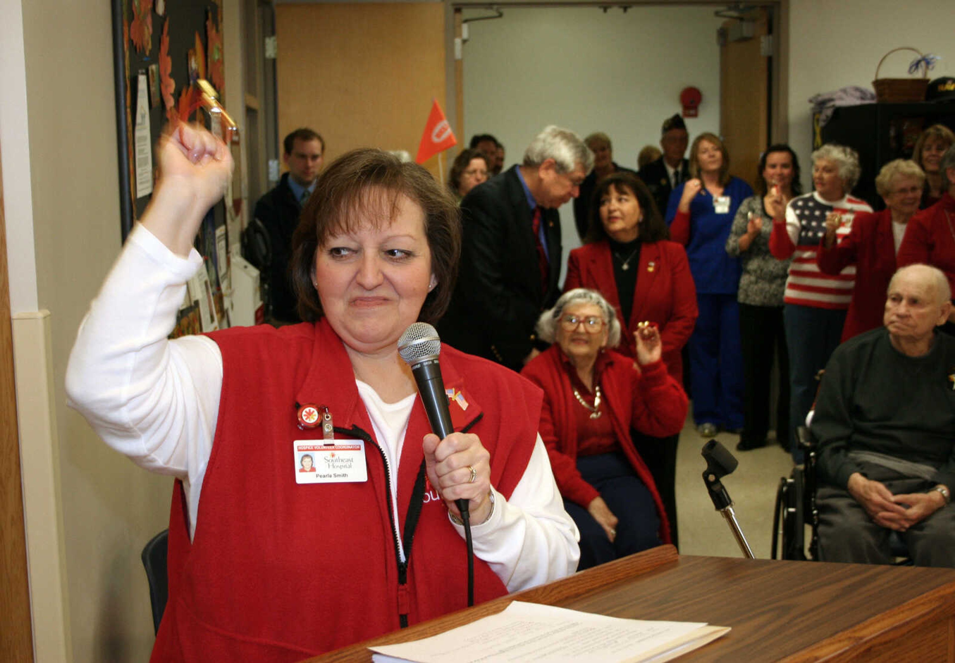 Southeast Hospice Volunteer Coordinator Pearla Smith rings bells as part of the "Let Freedom Ring" celebration on Veterans' Day, Nov. 11, 2011, at the Missouri Veterans Home in Cape Girardeau. Veterans, local dignitaries, staff at the home, friends, family members and the St. Andrew Lutheran Church bell choir rang bells for two minutes at 11 a.m. in celebration of Veterans' Day. Southeast Hospice helped organize the event. (Submitted photo)