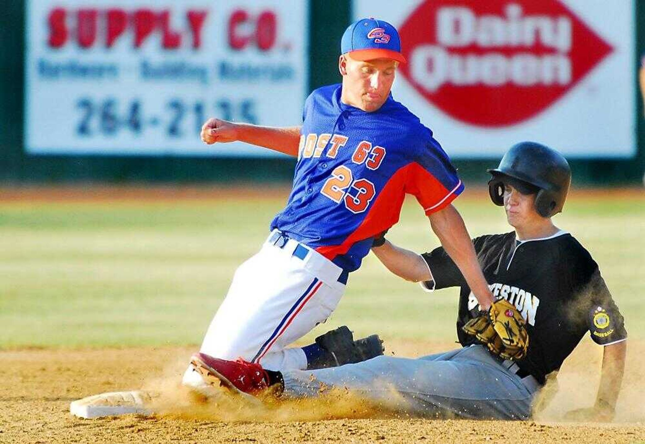 Mark Himmelberg tagged out Sikeston's Garret Limbaugh at second base Wednesday during the fourth inning of the first game of a doubleheader. (AARON EISENHAUER ~aeisenhauer@semissourian.com)