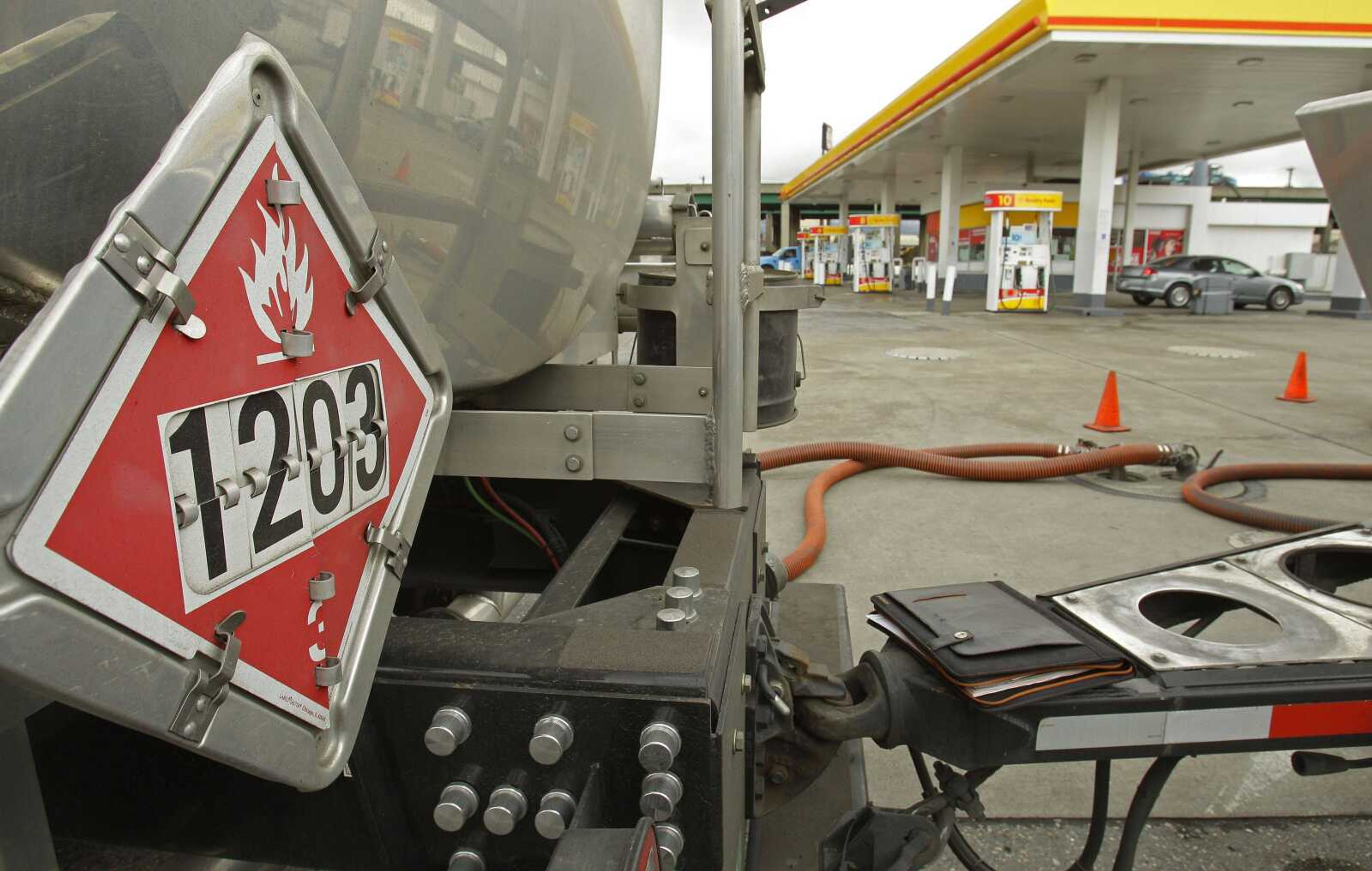 Gasoline is delivered in Oakland, Calif. Consumer spending rose in February at the fastest pace in four months, but a big part of the increase went to cover higher prices for gas. (Associated Press file)