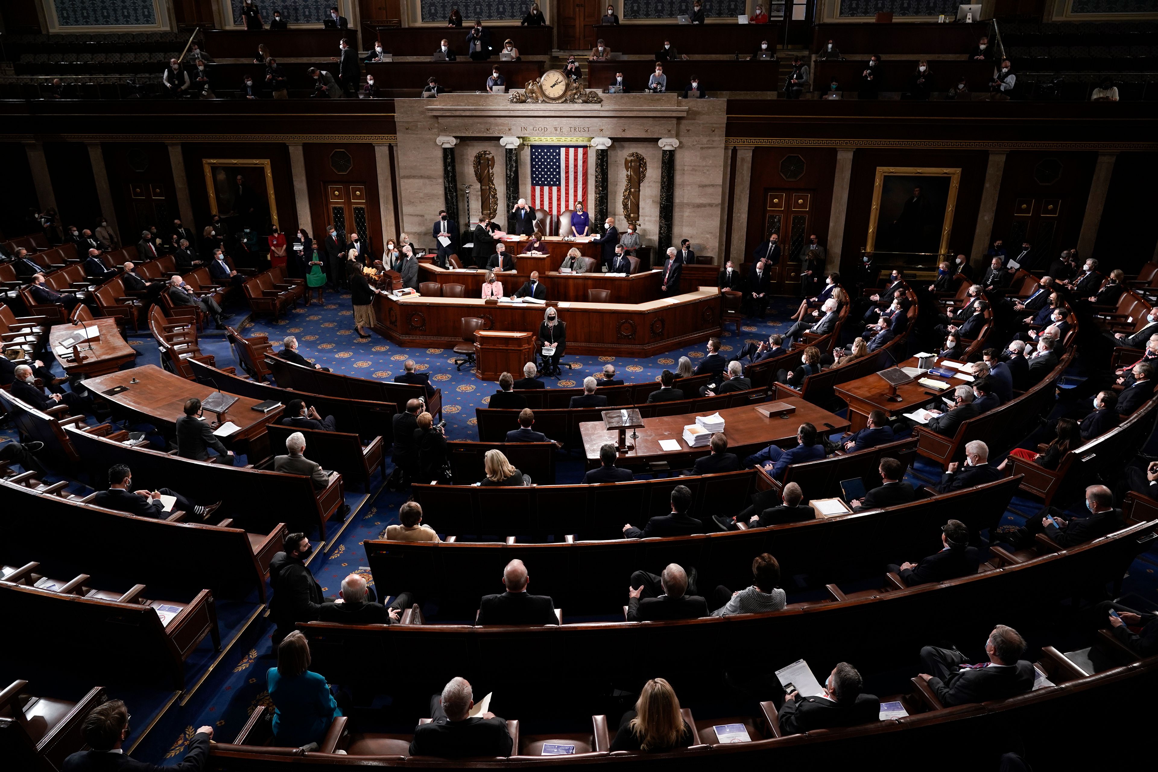 FILE - Vice President Mike Pence and Speaker of the House Nancy Pelosi, D-Calif., officiate as a joint session of the House and Senate convenes to count the Electoral College votes cast in the presidential election, at the Capitol in Washington, Jan. 6, 2021. (AP Photo/J. Scott Applewhite, File)