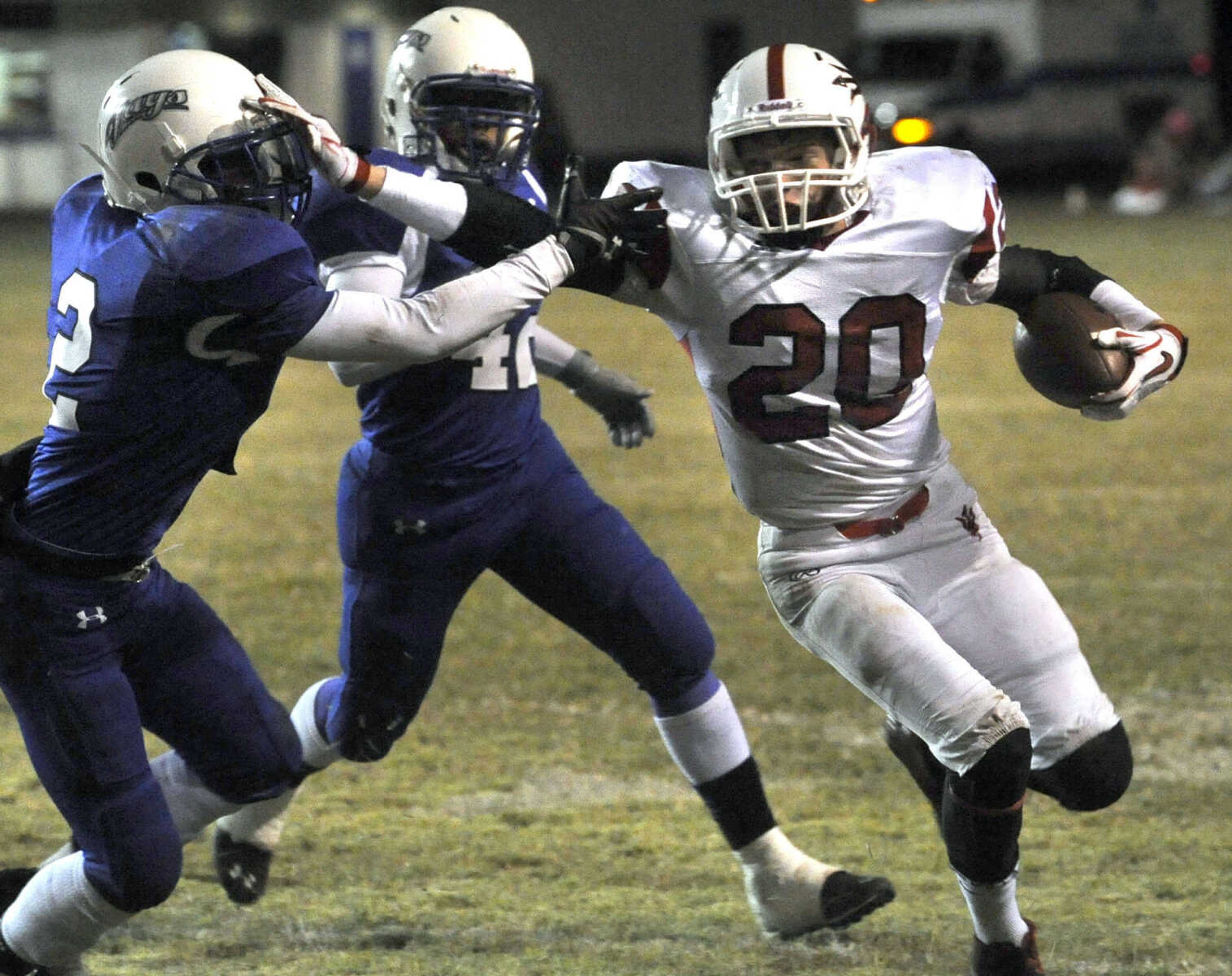 Chaffee's Charlie Montgomery stiff-arms Charleston's Mike Kellum during the second quarter Friday, Oct. 25, 2013 in Charleston, Mo. (Fred Lynch)