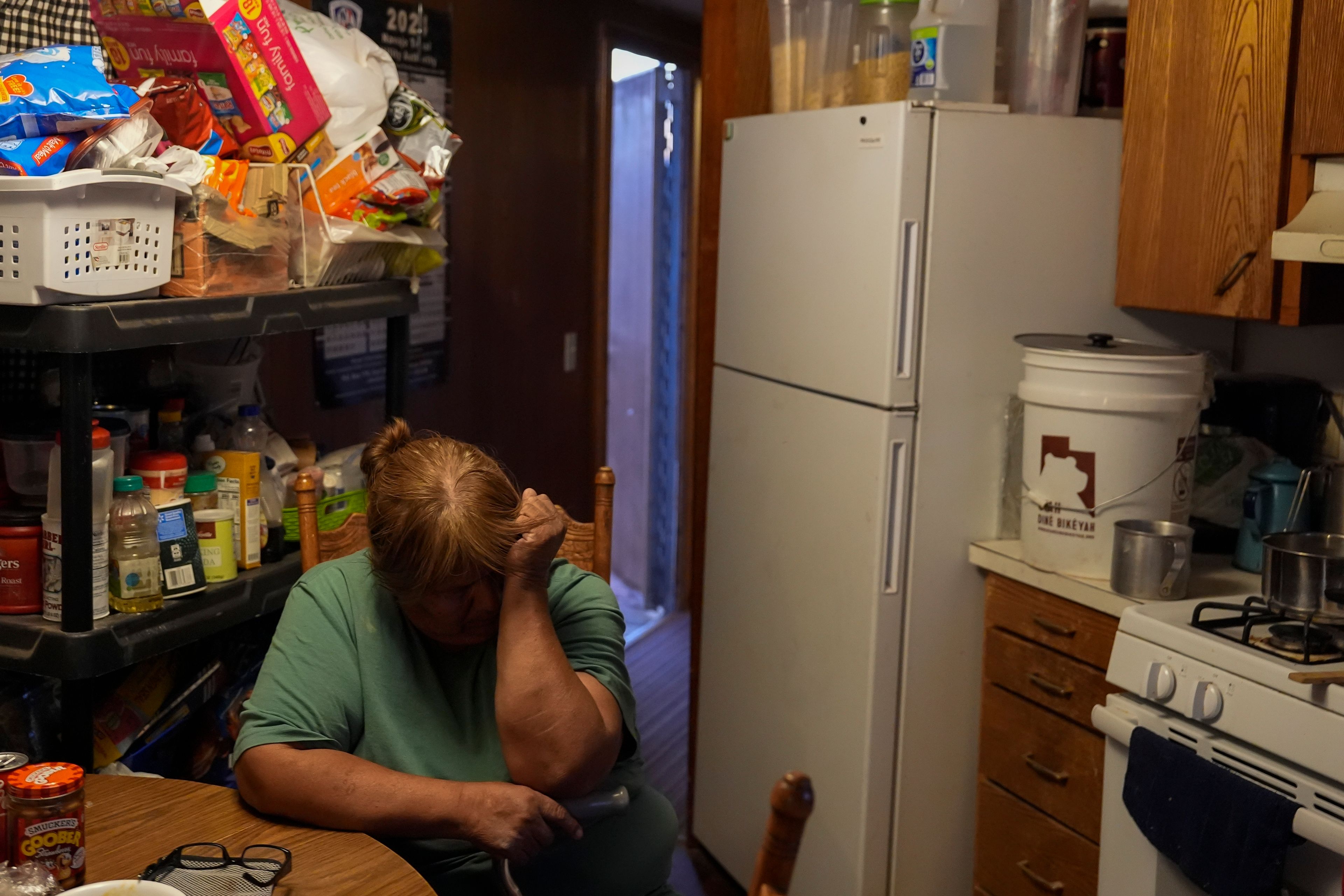 Lorraine Black sits inside her kitchen, Wednesday, Oct. 9, 2024, on the Navajo Nation in Halchita, Utah. (AP Photo/Joshua A. Bickel)