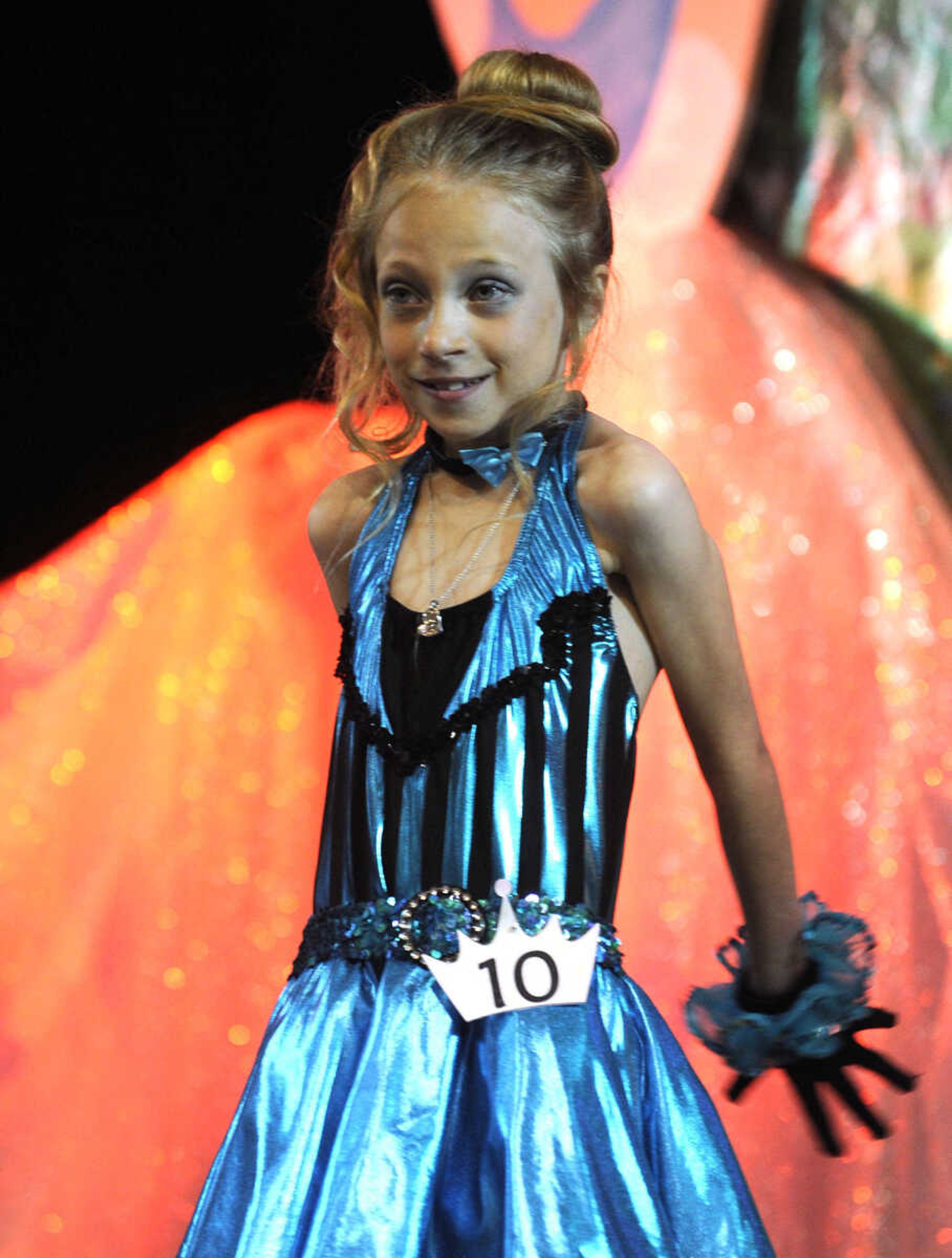 Destinay Joyce poses for the judges in the 5-9 age division of the S. E. Missouri Angels Pageant on Saturday, April 26, 2014 at Scott City High School.