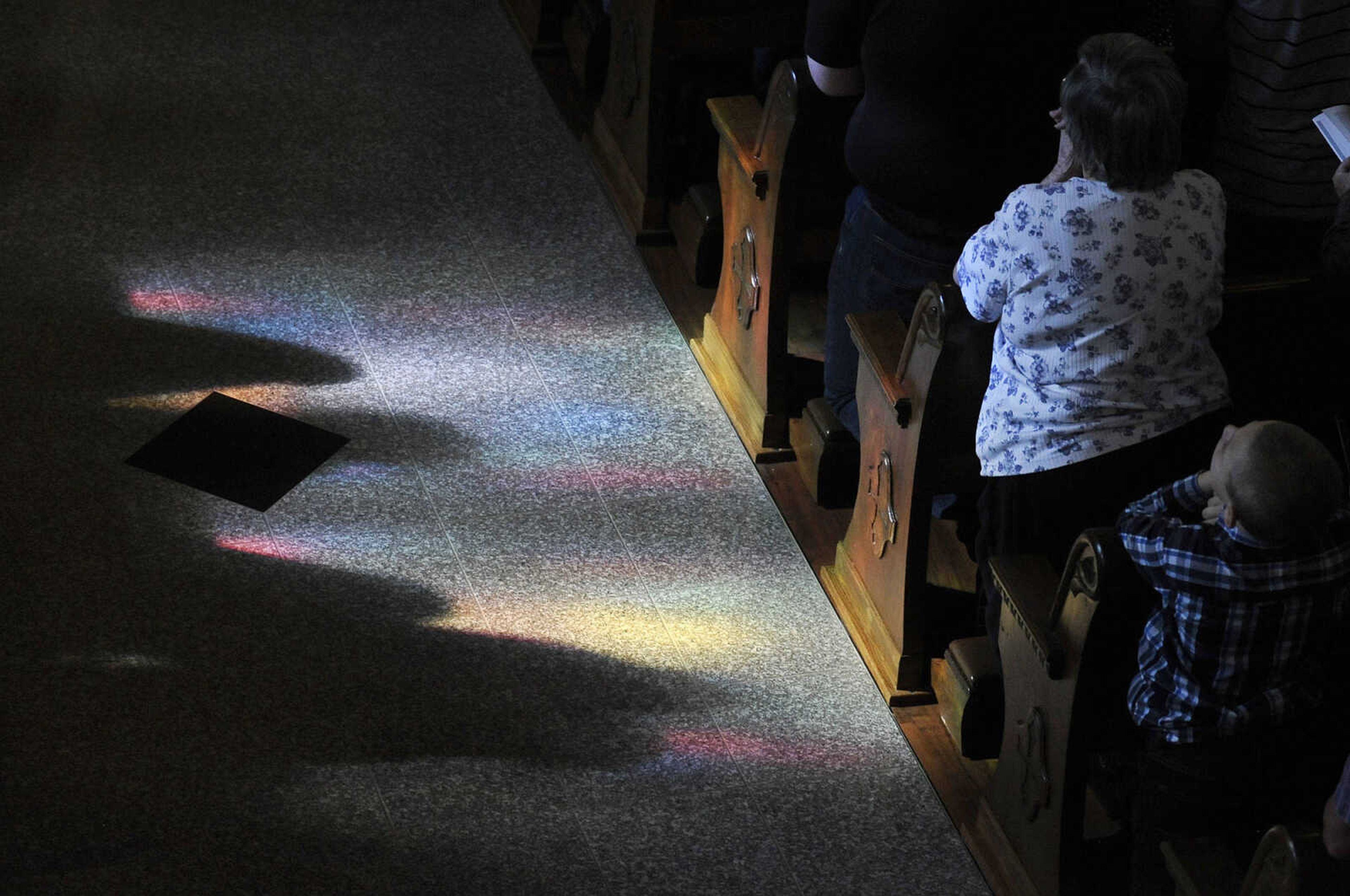 LAURA SIMON ~ lsimon@semissourian.com

Parishioners stand during the first mass inside the newly remodeled St. John's Catholic Church in Leopold, Missouri on Sunday, May 29, 2016.