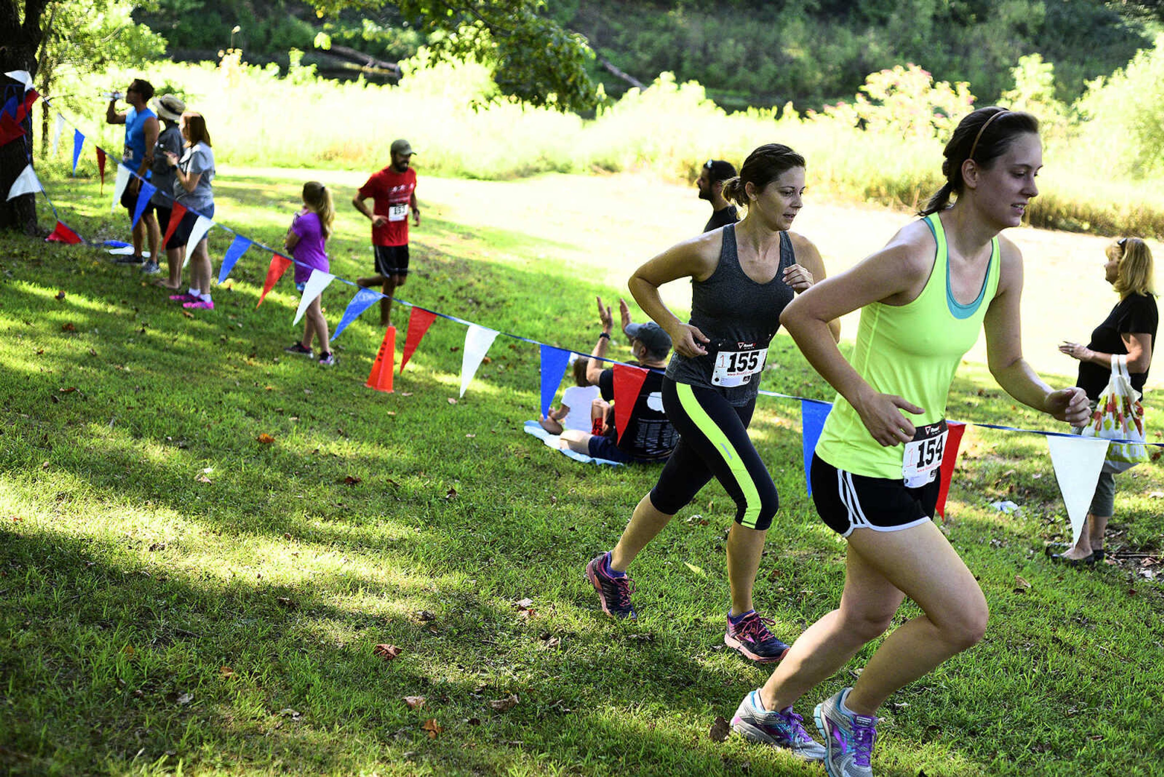 Participants run after kayaking on Lake Boutin during the first ever St. Jude Heroes Yak 'n Run on Saturday, Aug. 26, 2017, at Trail of Tears State Park. All proceeds from the event support St. Jude Children's Research Hospital