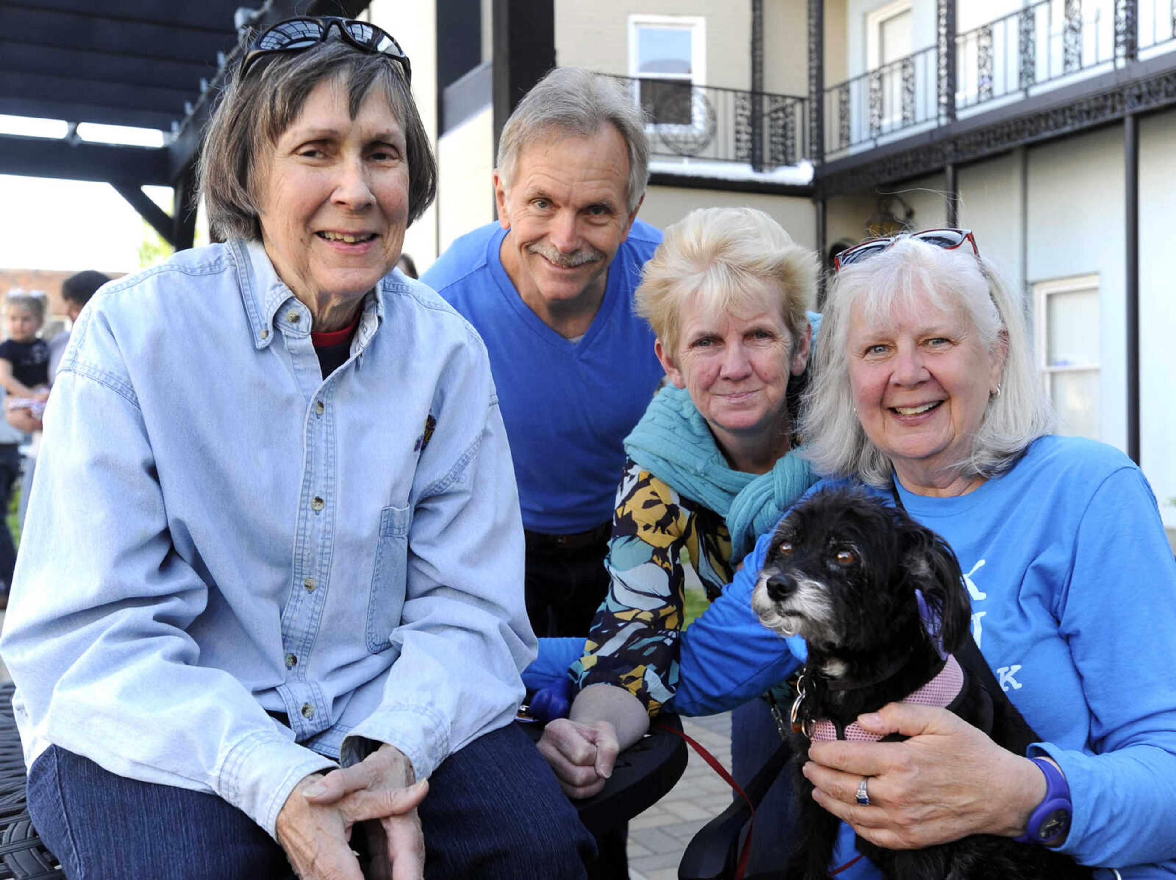 Judy Cureton, left, Jim Amelung, Renate DeBlois and Jean Strickland with Lulu pose for a photo Friday, April 15, 2016 at the opening reception for the Outdoor Sculpture Exhibit on Broadway in Cape Girardeau.