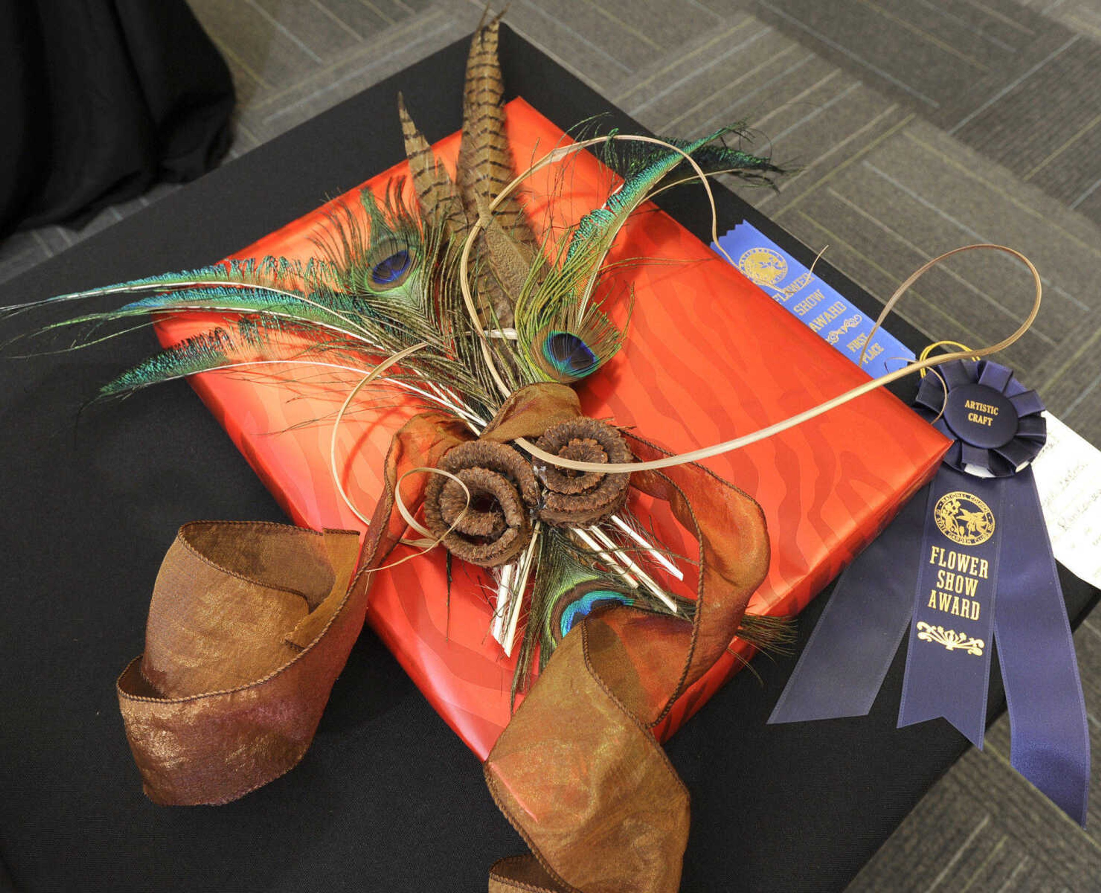 Arts and crafts: decorated package by Lynn Westrich, Ramblewood Garden Club, first place, artistic craft award.