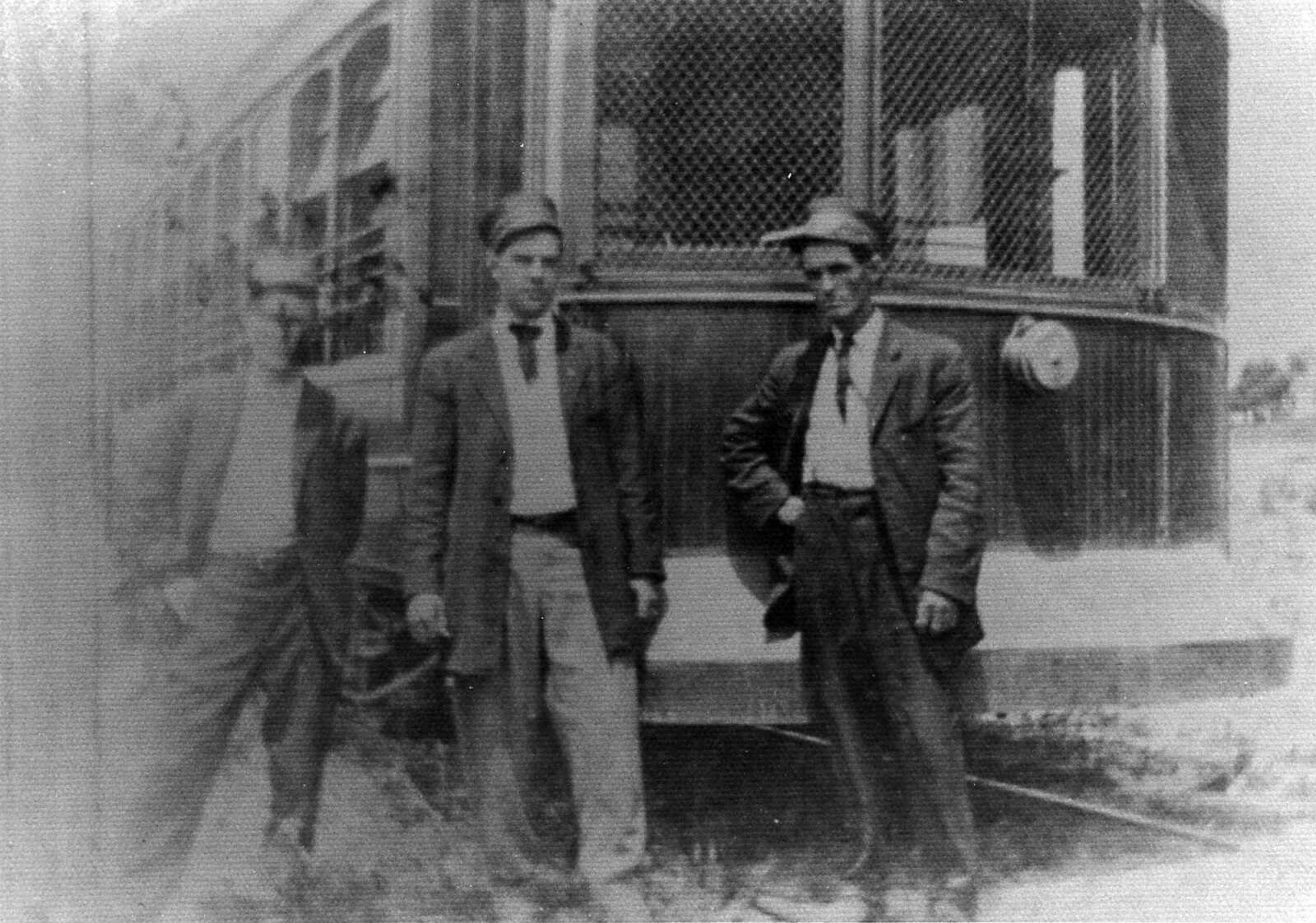 Three street car conductors posed for this picture alongside a trolley car sometime before 1915.  Only Walter Poe, right, has been identified. (Wanda Poe Fitzpatrick)