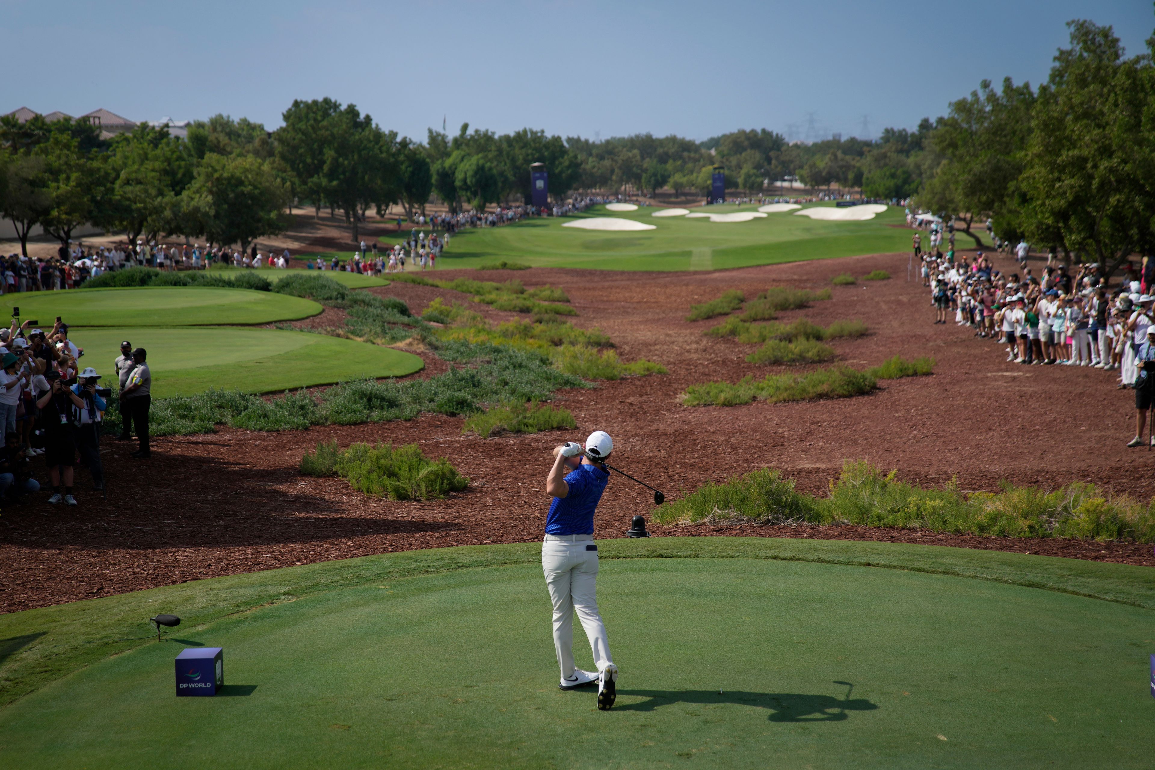 Rory McIlroy of Northern Ireland hits off the first tee in the final round of World Tour Golf Championship in Dubai, United Arab Emirates, Sunday, Nov. 17, 2024. (AP Photo/Altaf Qadri)