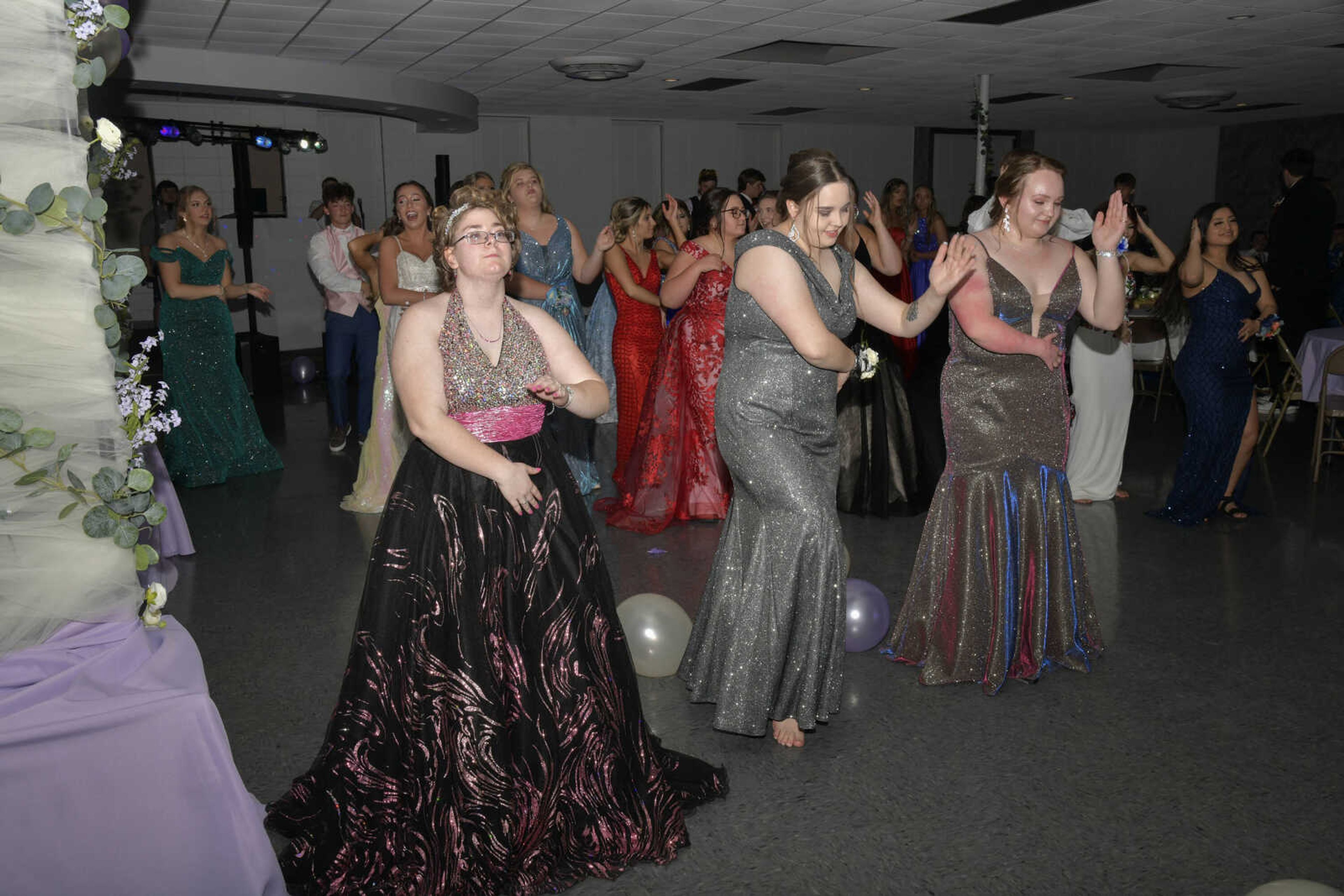 Students dance to "La Macarena" during prom at the Front Porch in Scott City on Saturday, April 24, 2021.