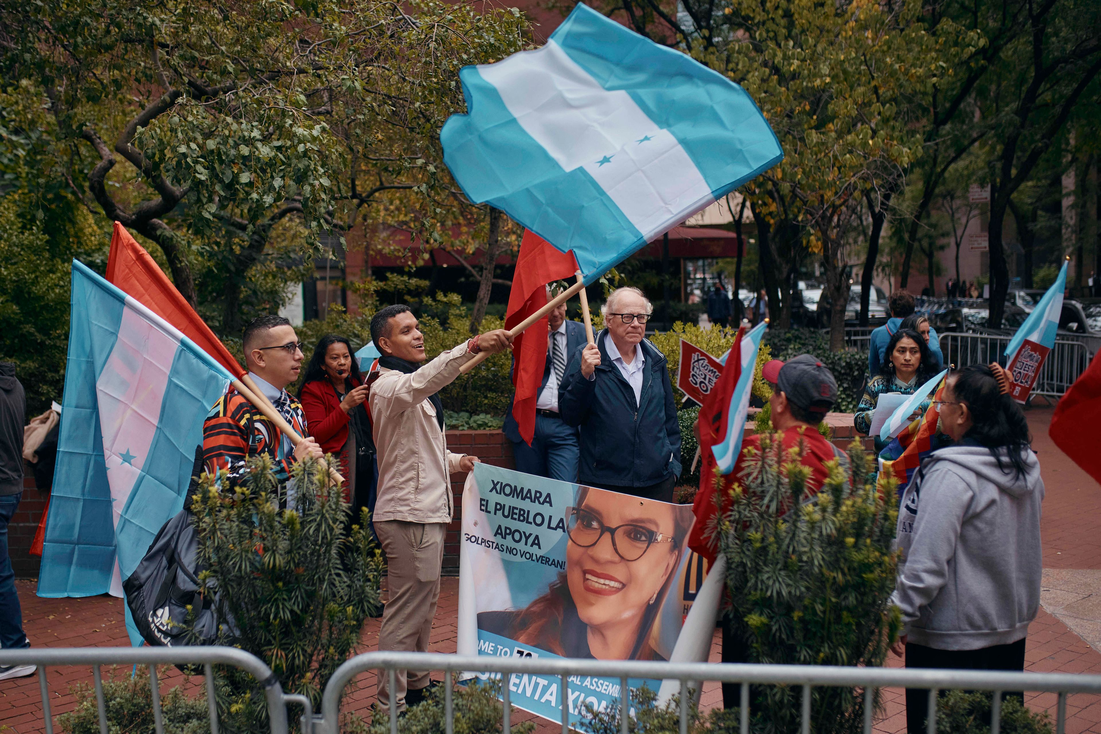 People demonstrate in support of President of Honduras, Xiomara Castro, near the United Nations headquarters during the 79th session of the United Nations General Assembly, in New York, Wednesday, Sept. 25, 2024. (AP Photo/Andres Kudacki)