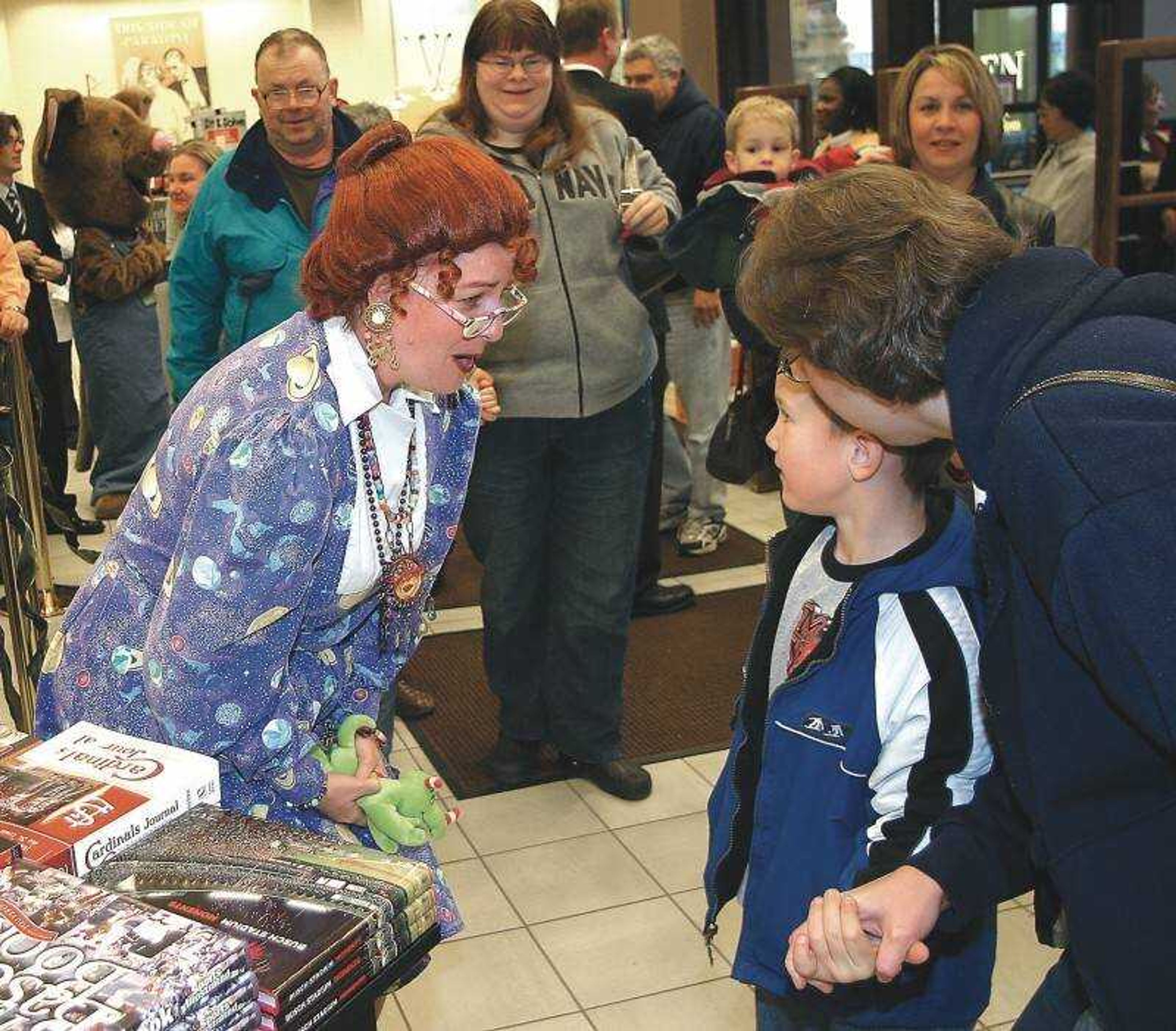 "Miss Frizzle," left,  greeted Dylan Webb and Kim Webb as they entered Barnes & Noble Bookstore's new location inside West Park Mall in Cape Girardeau Tuesday. (Pat Young)