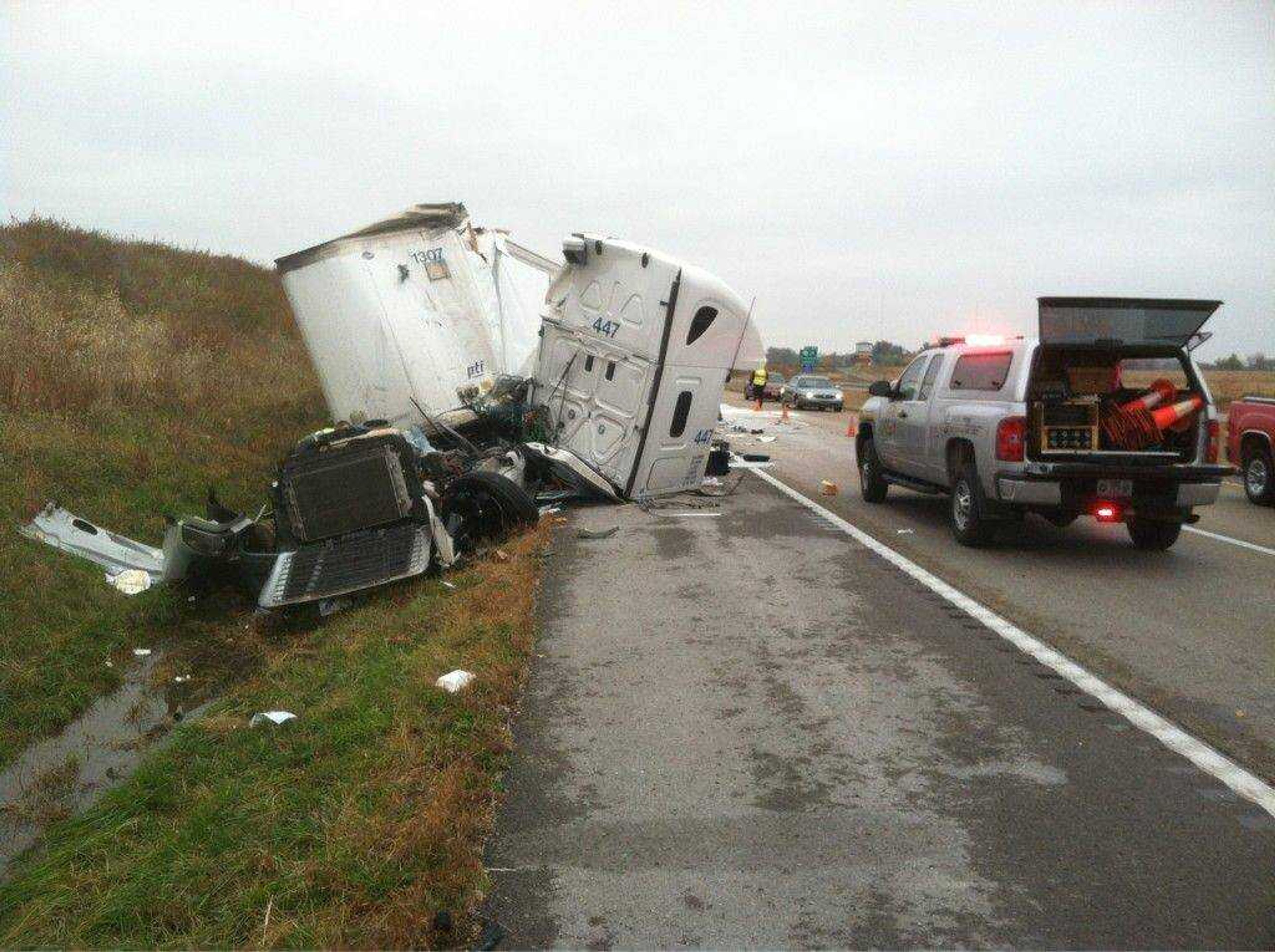 The wreckage of a semi-truck is seen Friday, Nov. 4, 2011, on I-55 at the 105 mile marker. One driver was killed in the accident. (Patrick Sullivan)