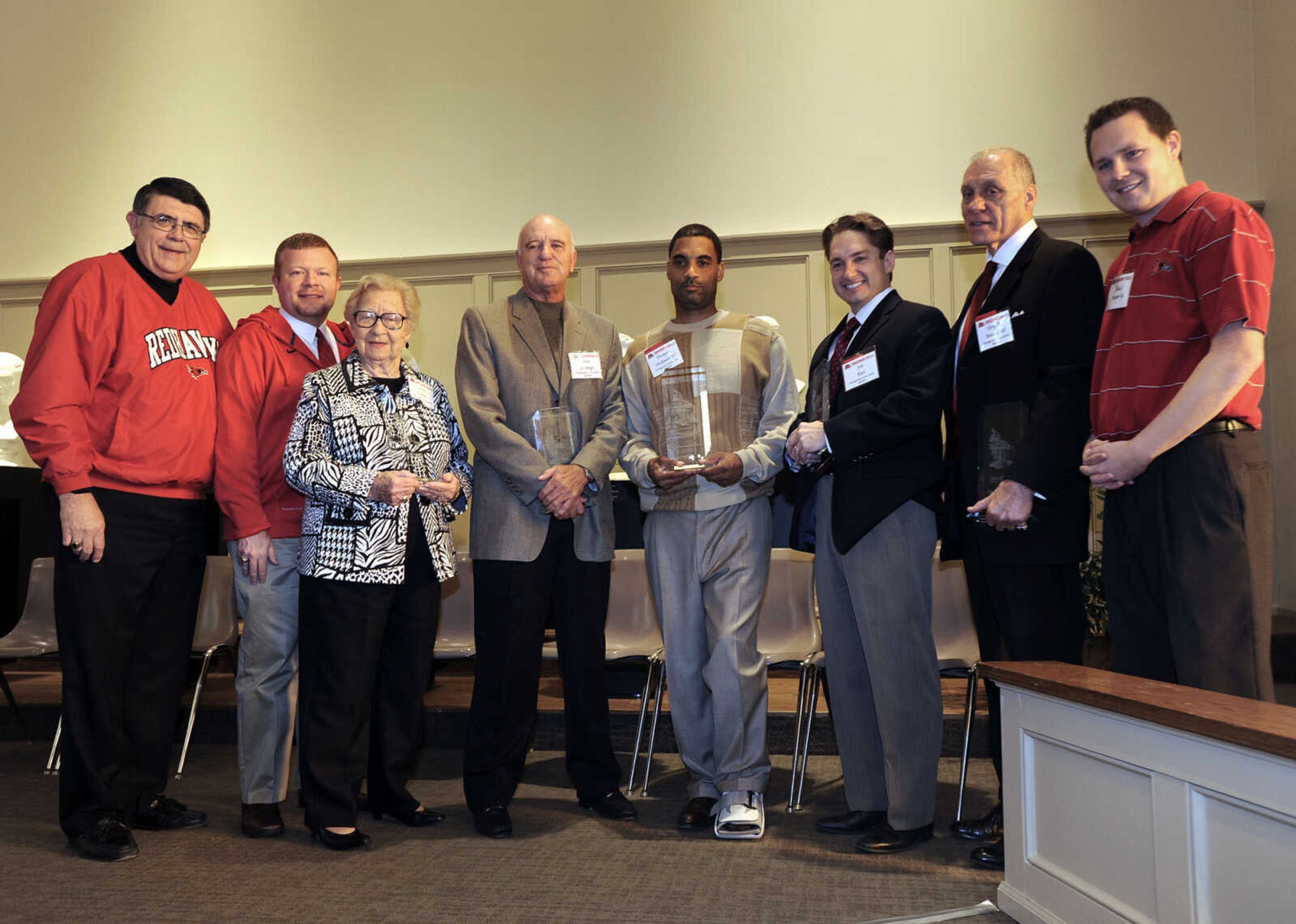 FRED LYNCH ~ flynch@semissourian.com
Distinguished Service Awards were presented during the All-Alumni Breakfast Saturday, Oct. 22, 2011 at the Wehking Alumni Center. From left: Southeast Missouri State University President Dr. Ken Dobbins, Jeff Davis, alumni board president; recipients Grace Hoover, Dan Jennings, Dwayne Hickman, Jon Kurka Rust andTerry Benassi, and Shad Burner, director of Alumni Services at Southeast.