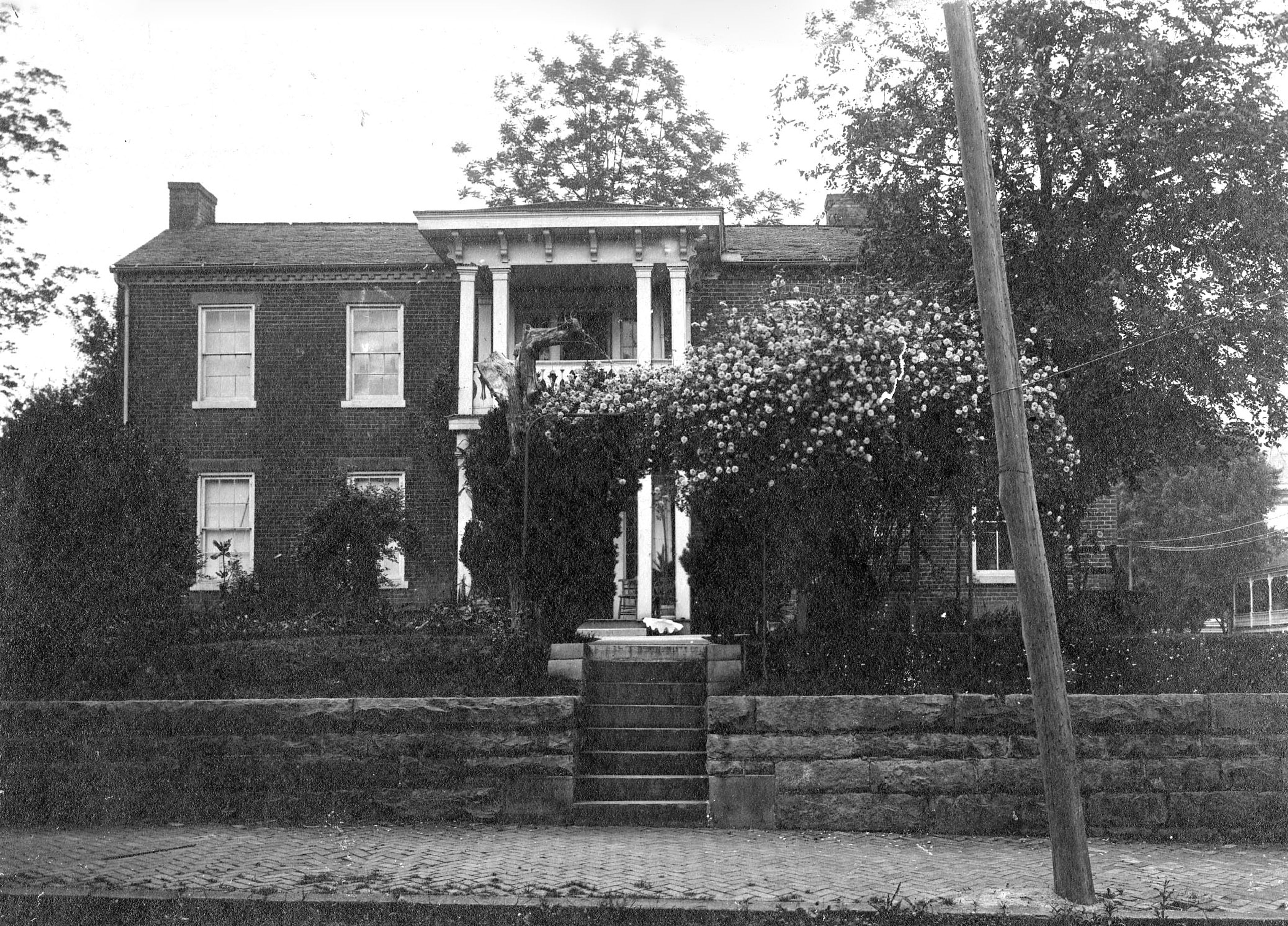 The stones from the walls that skirted the Doyle property at the southwest corner of Broadway and Lorimier Street were reused in the construction of a retaining wall south of the Missourian Building in 1924.