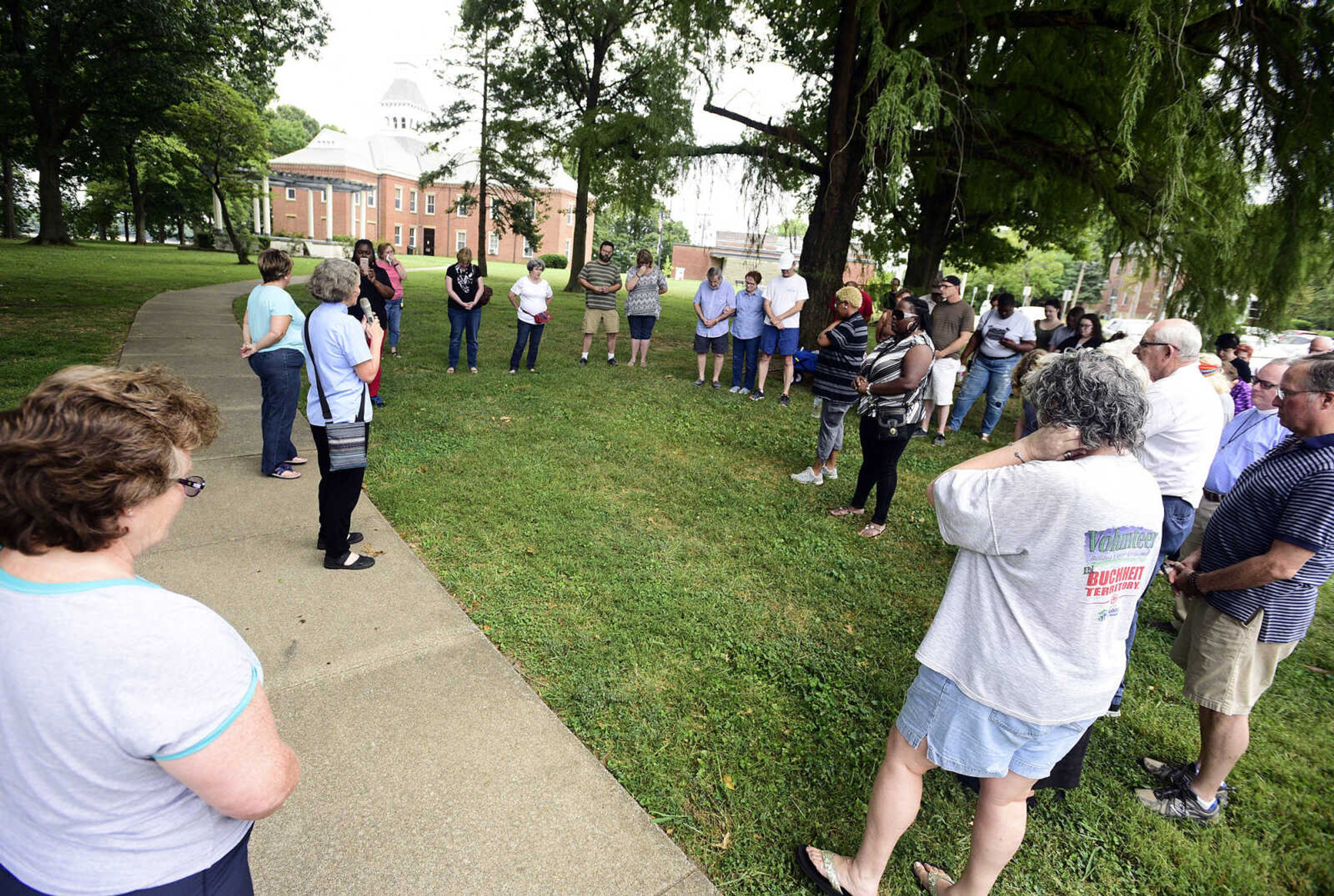 People gather for the Love, Not Hate rally on Sunday evening, Aug. 13, 2017, at Ivers Square in Cape Girardeau.