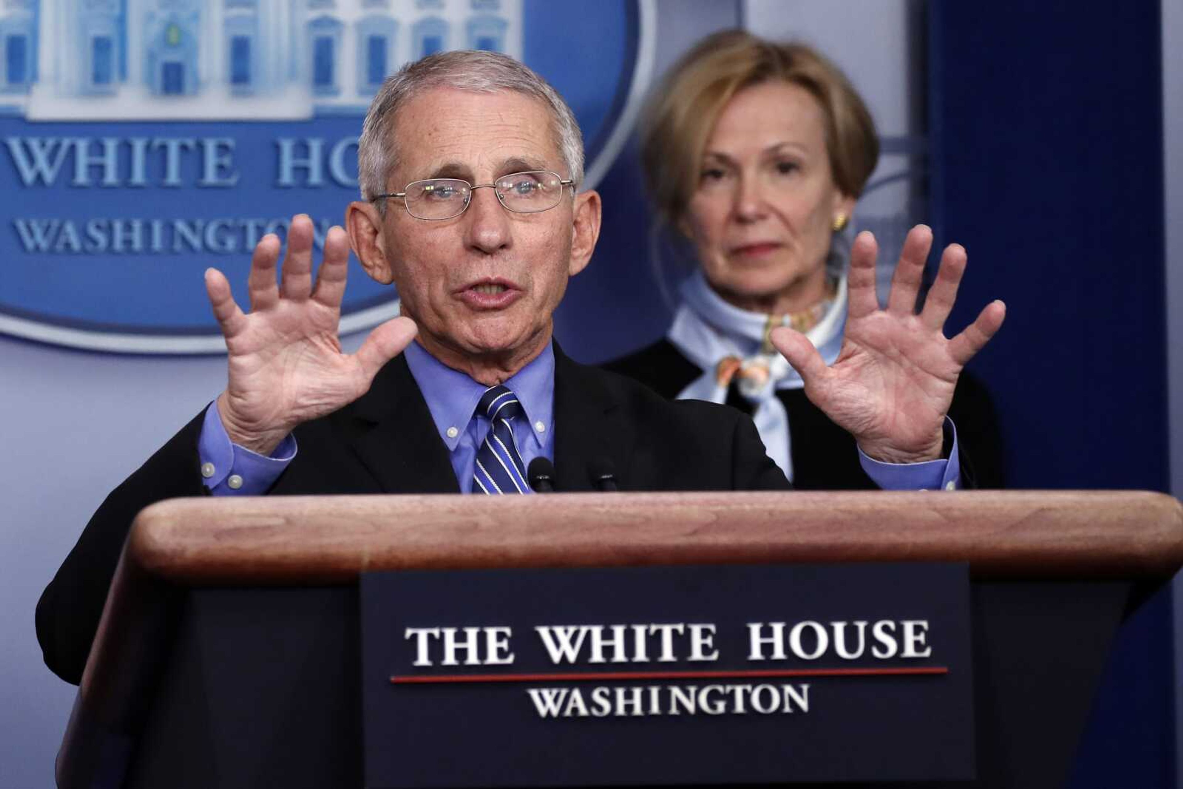 Dr. Anthony Fauci, director of the National Institute of Allergy and Infectious Diseases, speaks about the coronavirus in the James Brady Briefing Room on Tuesday in Washington, as Dr. Deborah Birx, White House coronavirus response coordinator, listens.