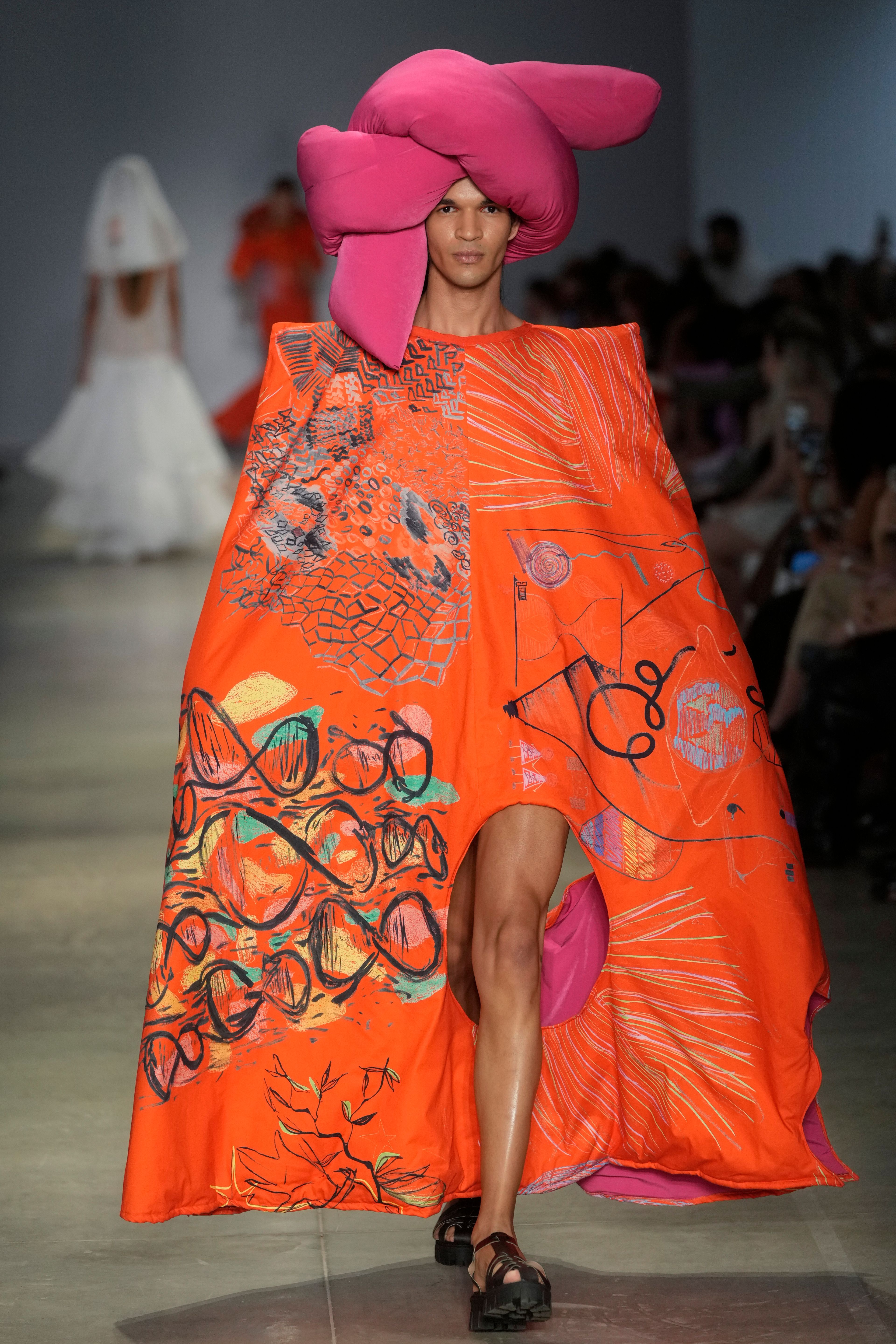 A model wears a creation from the Cria Costura collection during Sao Paulo Fashion Week in Sao Paulo, Thursday, Oct. 17, 2024. (AP Photo/Andre Penner)