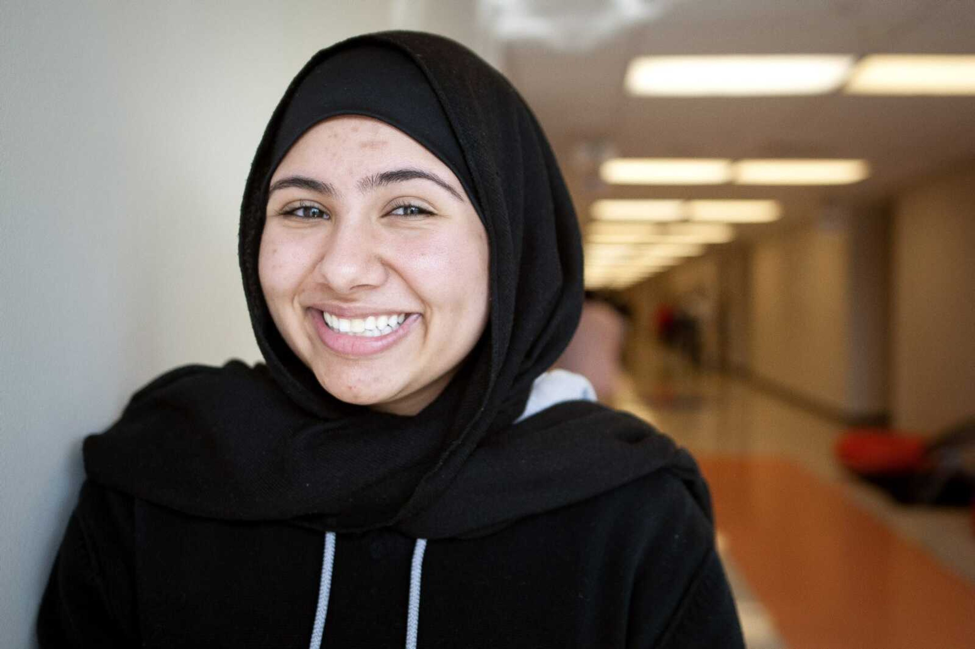 Cape Girardeau Central High School student Jowairia Khalid, 17, poses for a portrait Thursday at the school. Jowairia, who is fluent in Urdu, Arabic and English, is one of two CHS students seeking the Seal of Biliteracy upon graduation in May.