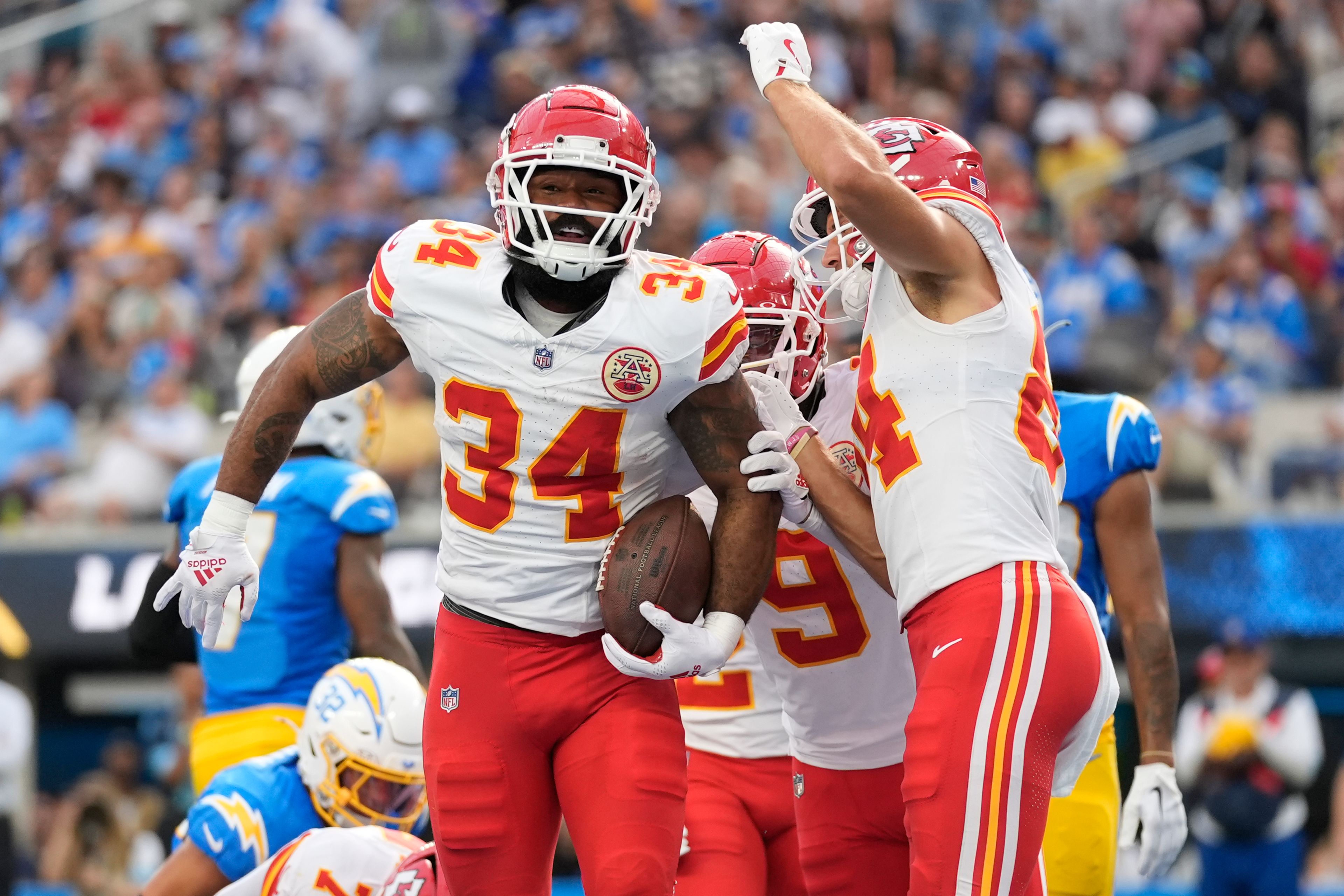 Kansas City Chiefs running back Samaje Perine celebrates after scoring during the second half of an NFL football game against the Los Angeles Chargers Sunday, Sept. 29, 2024, in Inglewood, Calif. (AP Photo/Ashley Landis)