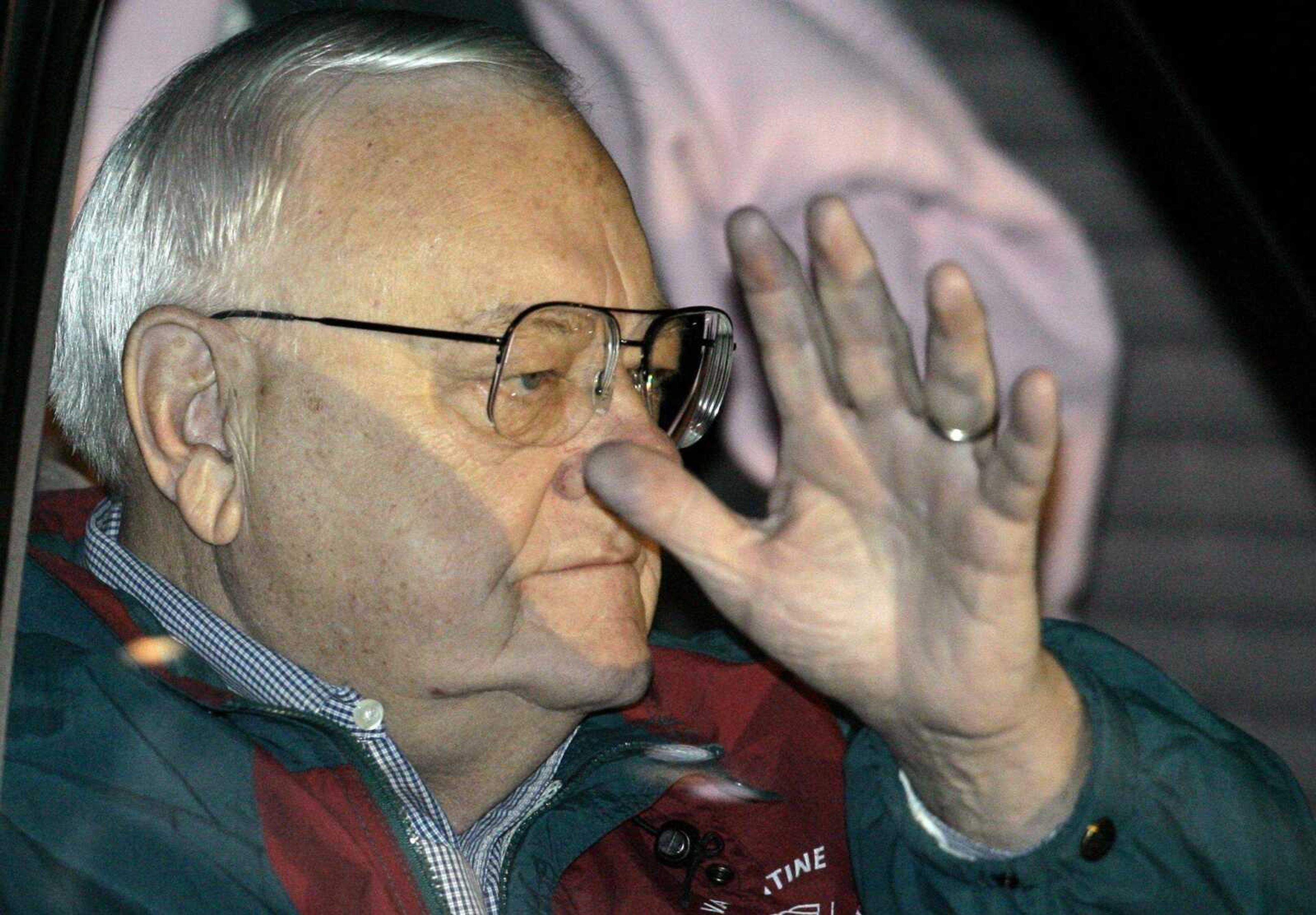 Former Illinois governor George Ryan waved from the family van Wednesday as he left his home in Kankakee, Ill., on the way to the federal prison in Oxford, Wis., to serve his sentence for his April conviction on racketeering and fraud charges. (Spencer Green ~ Associated Press)